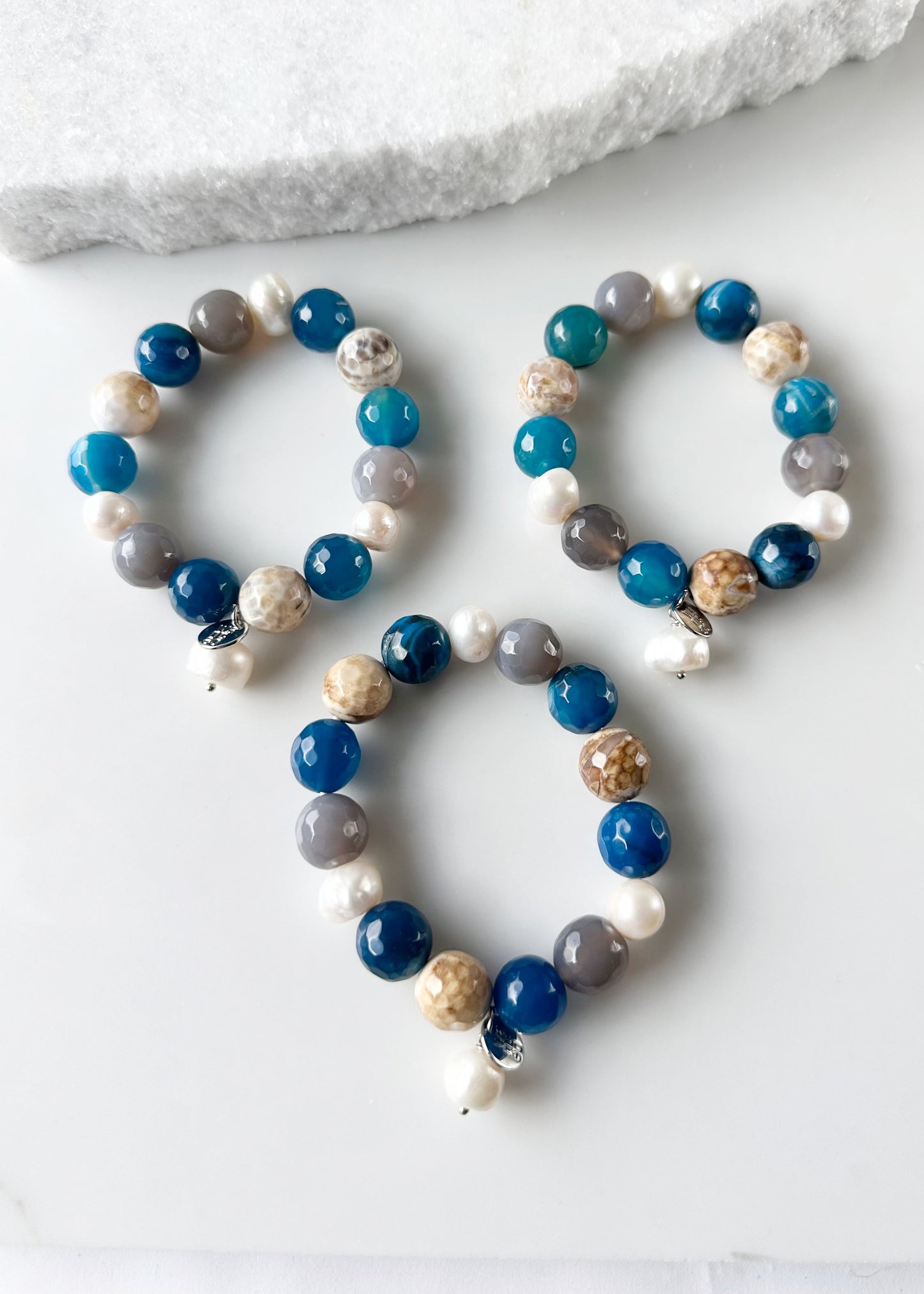 White Freshwater Pearl with Blue Semi-Precious Stone Mix Stretch Bracelet.  Perfect for layering! Three shown.