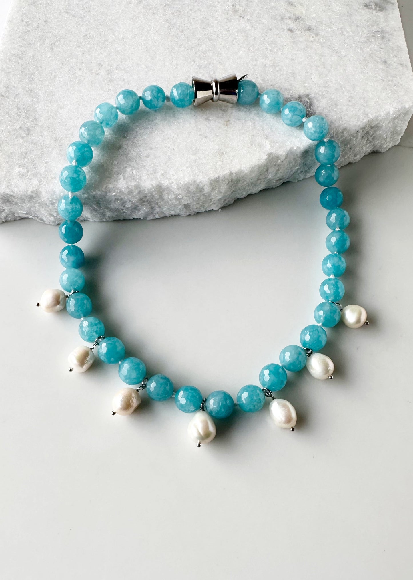 Necklace of Large Light Blue Faceted Agate with seven White Freshwater Drop Pearls.  Strong Secure Magnetic Clasp makes for Easy Wear