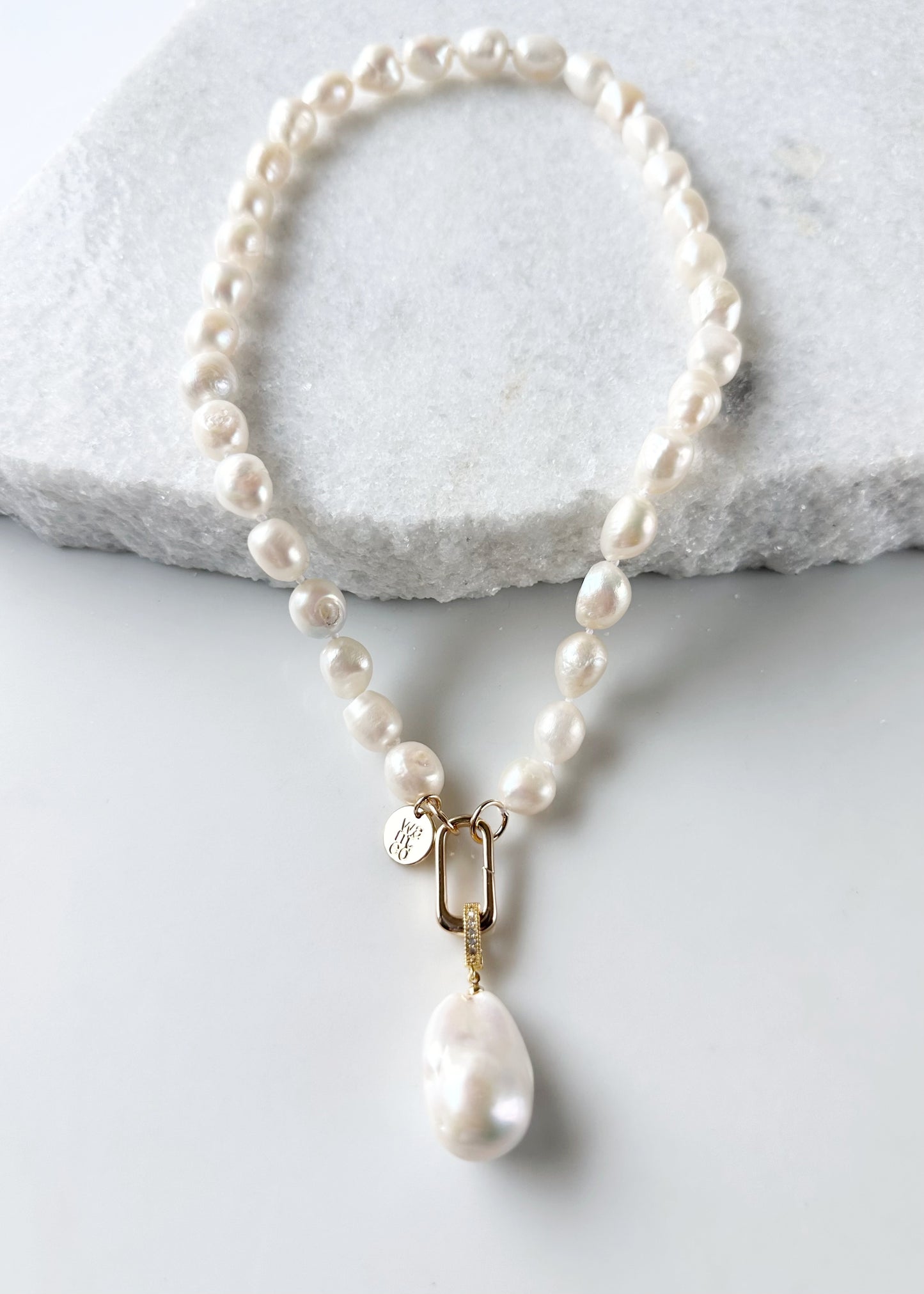 Large Baroque White Freshwater Pearl Pendant on Gold-Plated Bail with In-Laid Cubic Zirconia.  This Clip-On Pendant allows you to wear it with many of your favorite Pearl Necklaces. Here, shown on White Pearl Necklace.