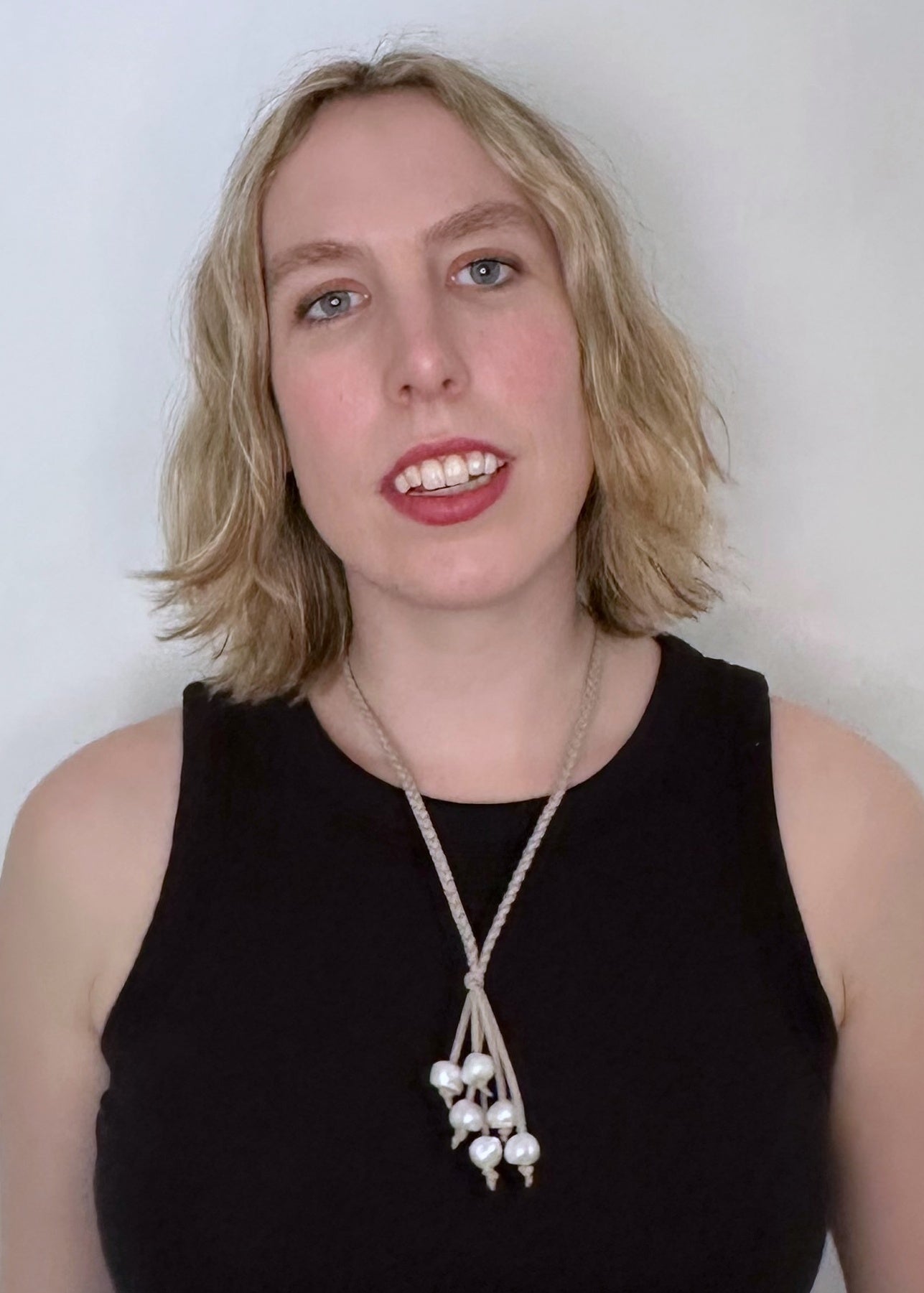 White Freshwater Pearl Necklace on Braided Grey Vegan Suede.  Strong Secure Magnetic Clasp for Easy Wear. Shown on Model