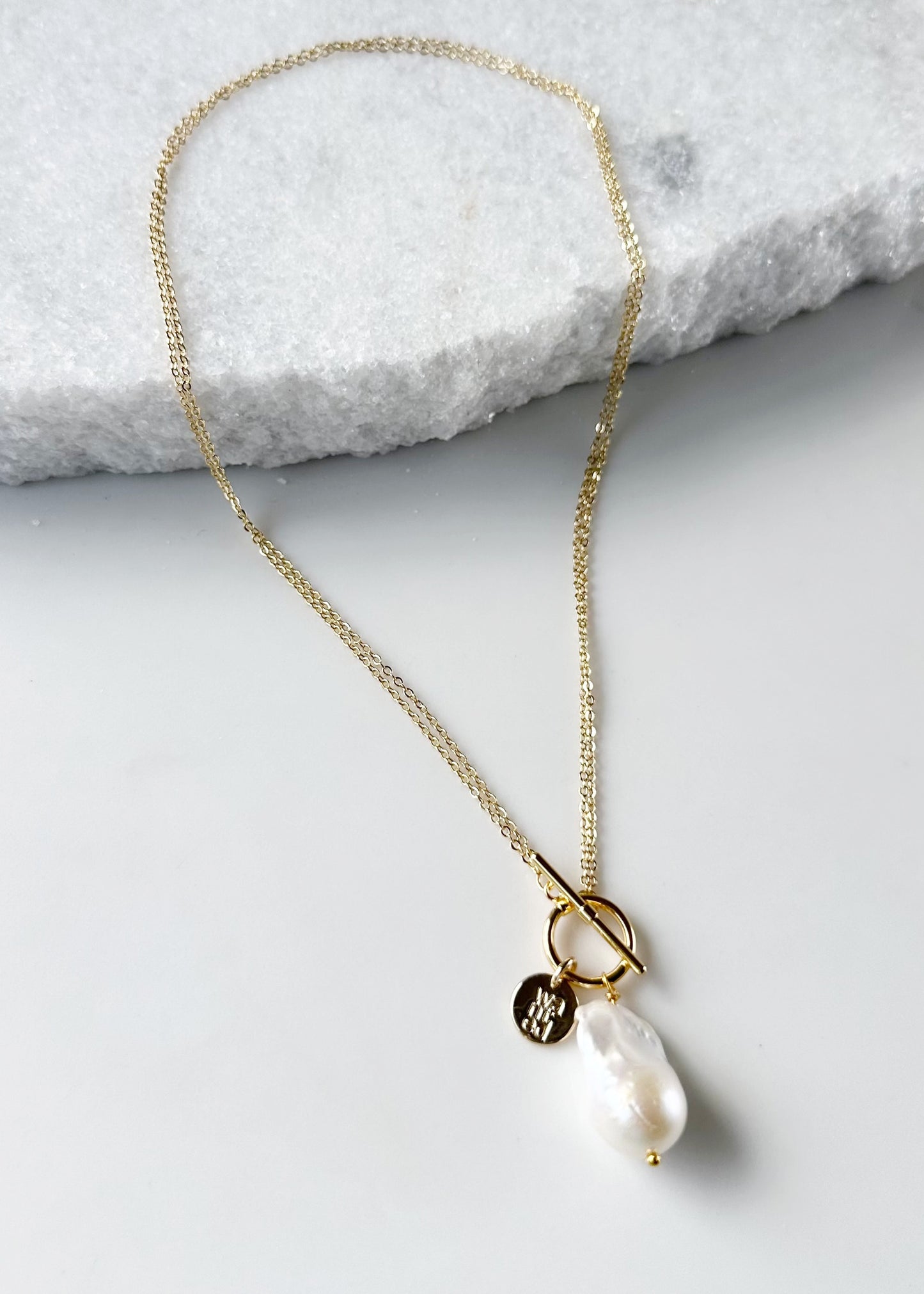 Extra Large White Baroque Freshwater Pearl on Gold-Plated Chain.