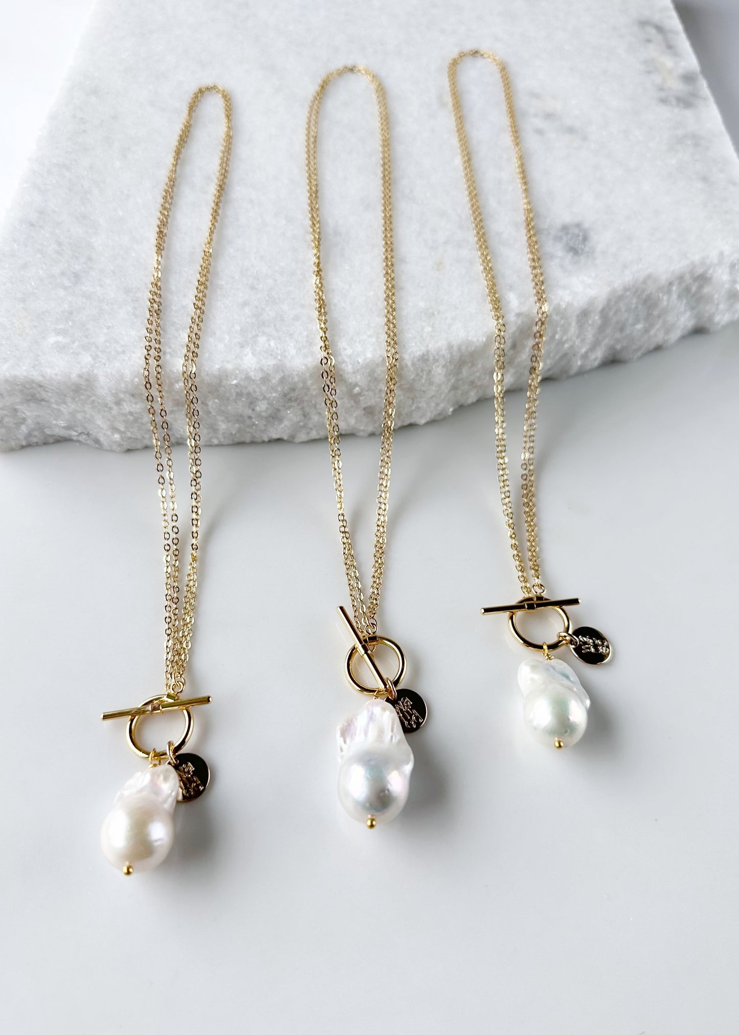 Extra Large White Baroque Freshwater Pearl on Gold-Plated Chain. Three shown to indicate Unique Shapes.