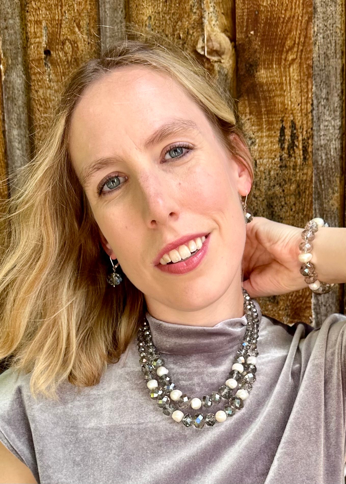 White Freshwater Pearls are joined by Smoke Faceted Crystals in the Stretch Bracelet. On Model with Complementary Necklace