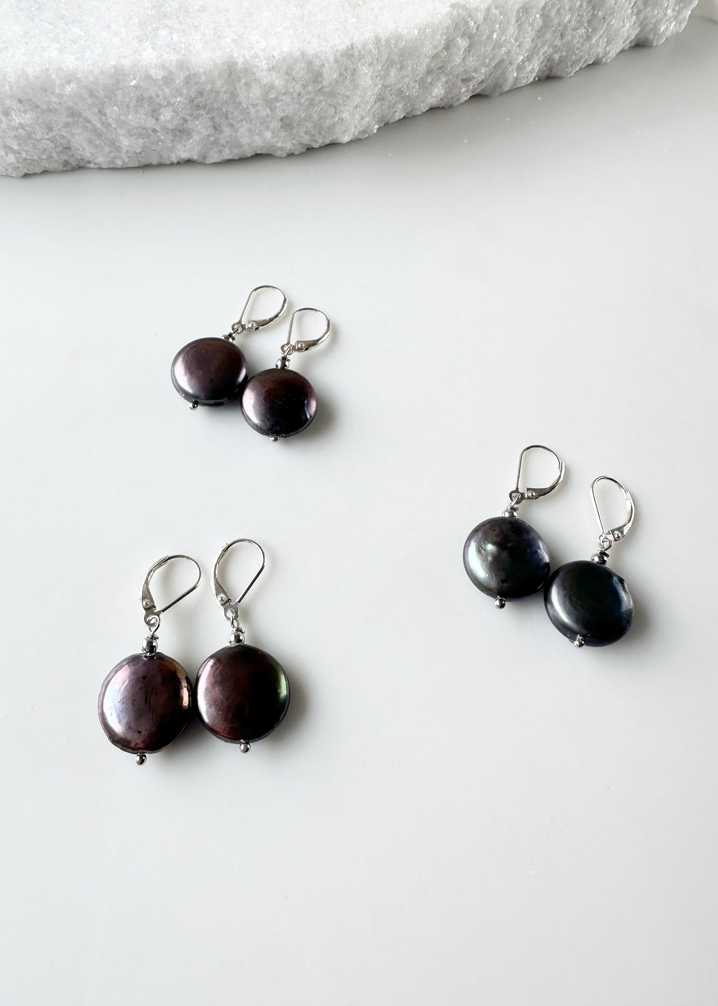 Black/Peacock Freshwater Coin Pearl Earrings with white crystal bead on Sterling Silver Lever backs.