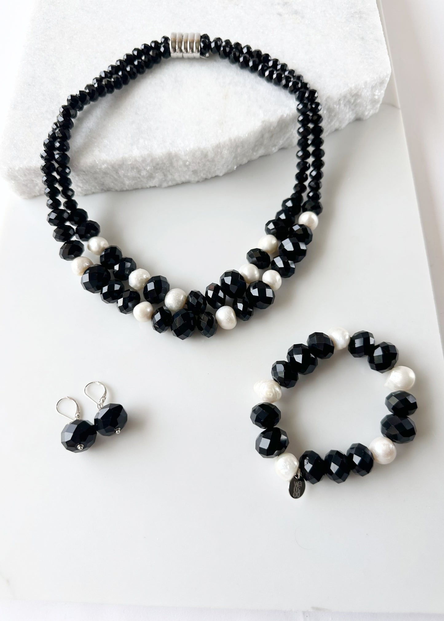 Two Strand White Freshwater Pearl Necklace with Large Faceted Black Crystals Joined by a Strong Secure Magnetic Clasp for Easy Wear.  Shown with Matching Bracelet and Earrings