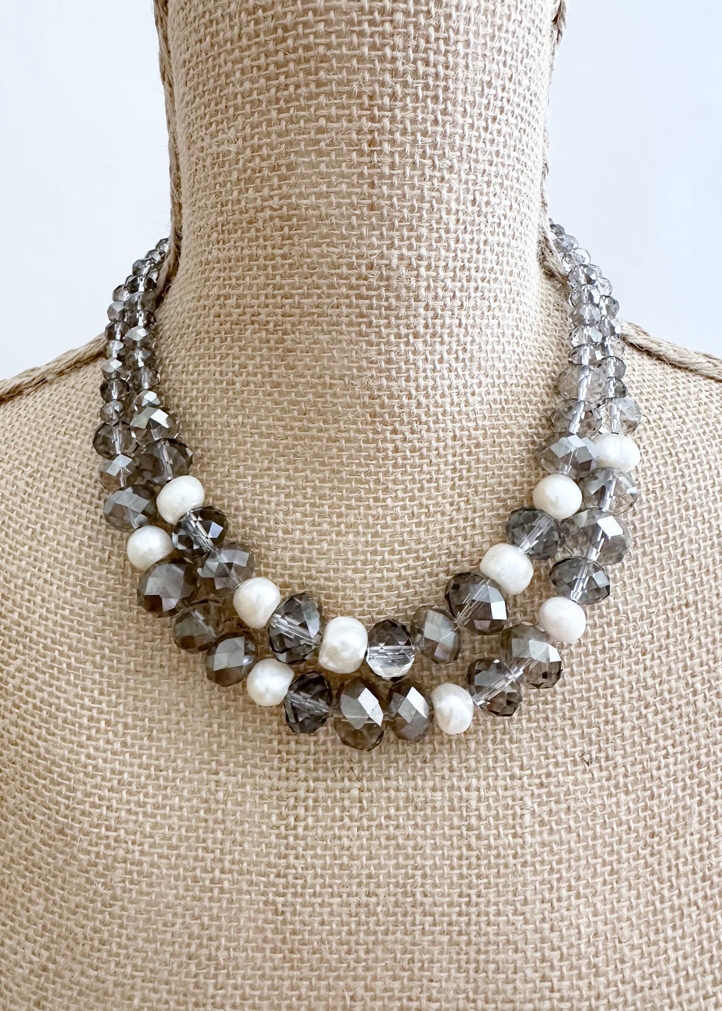 Two Strand White Freshwater Pearl Necklace with Large Faceted Smoke Crystals Joined by a Strong Secure Magnetic Clasp for Easy Wear.  On Bust