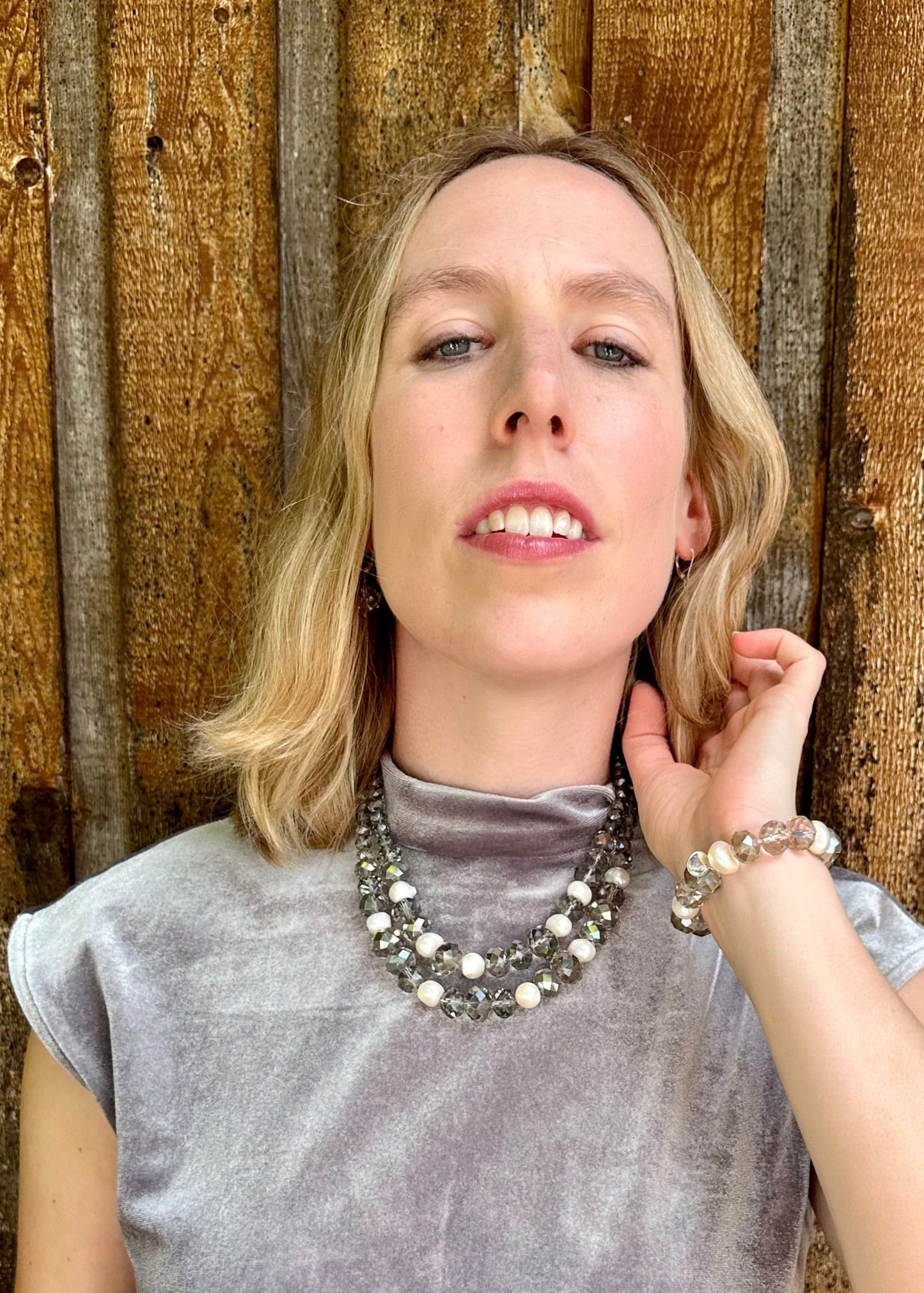 Two Strand White Freshwater Pearl Necklace with Large Faceted Smoke Crystals Joined by a Strong Secure Magnetic Clasp for Easy Wear.  Worn by Model with Matching Bracelet