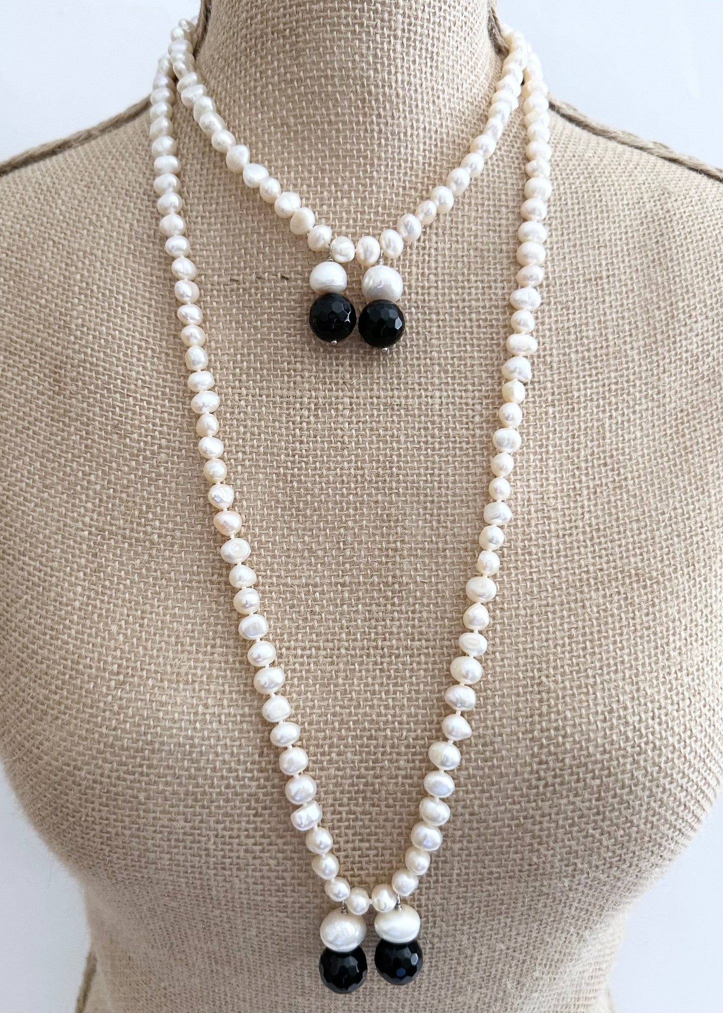 Long Generous Gold Freshwater Pearl Necklace with Larger Pearl and Black Agate drops.  Can be worn in many Styles. Style#3 On Bust