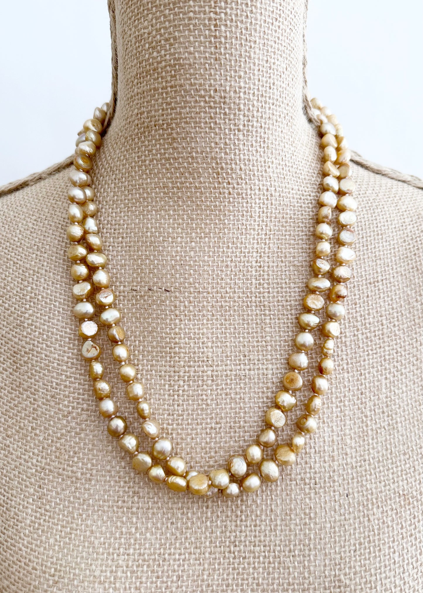 Long Necklace in Gold Baroque Freshwater Pearls. Wear as long Single strand or Doubled. On Bust