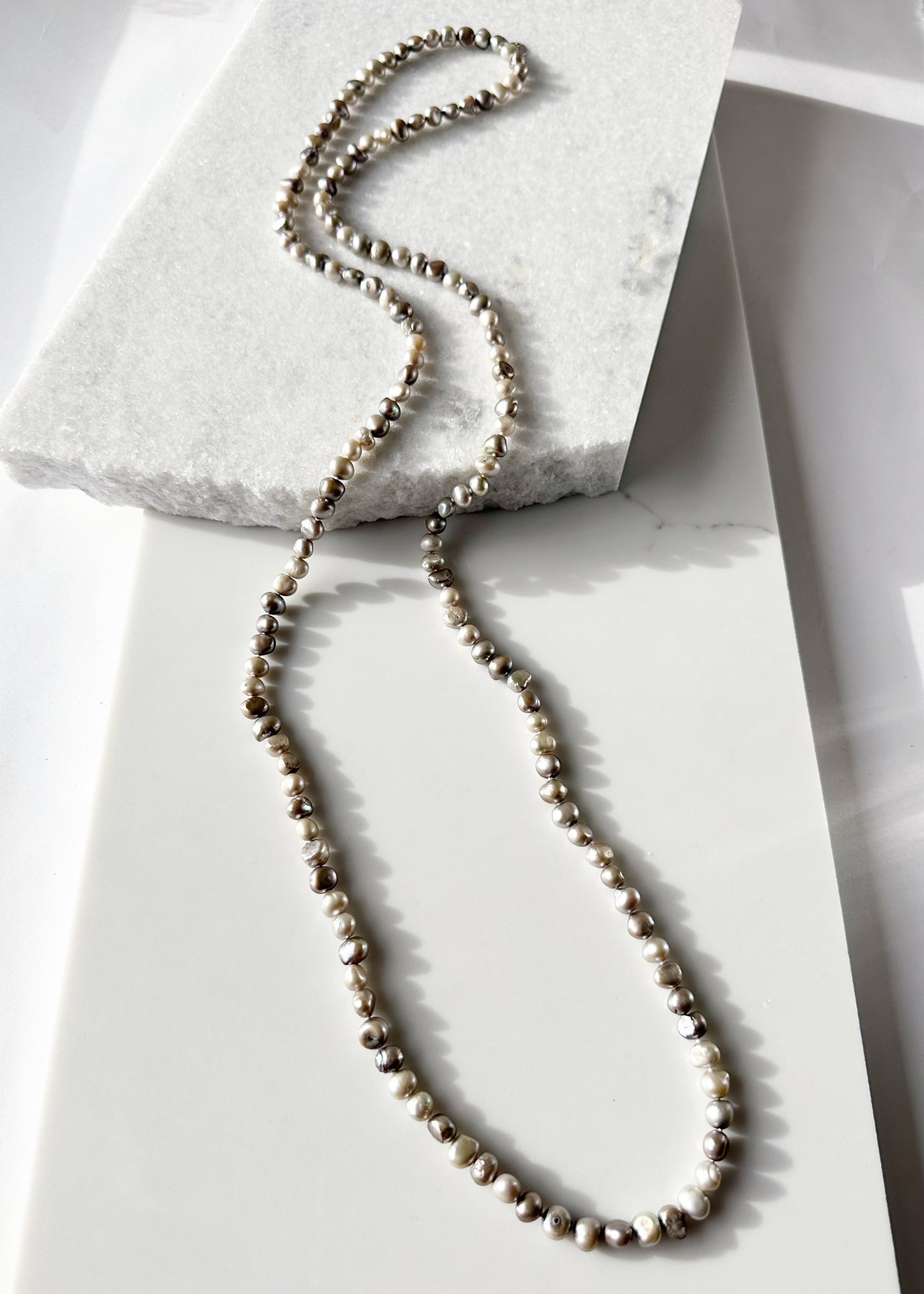 Long Necklace in Silver Baroque Freshwater Pearls. Wear as long Single strand or Doubled.