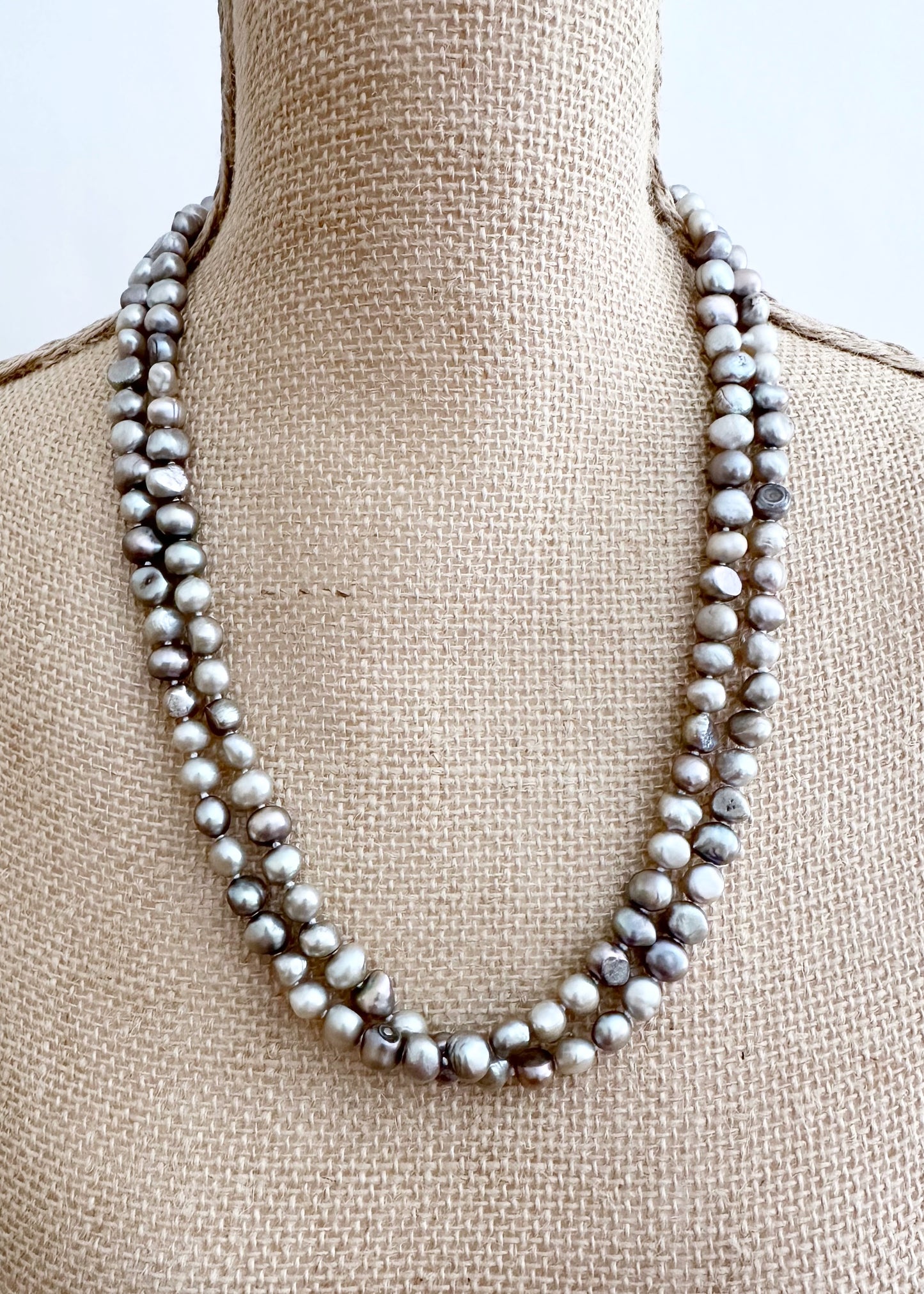 Long Necklace in Silver Baroque Freshwater Pearls. Wear as long Single strand or Doubled. On Bust