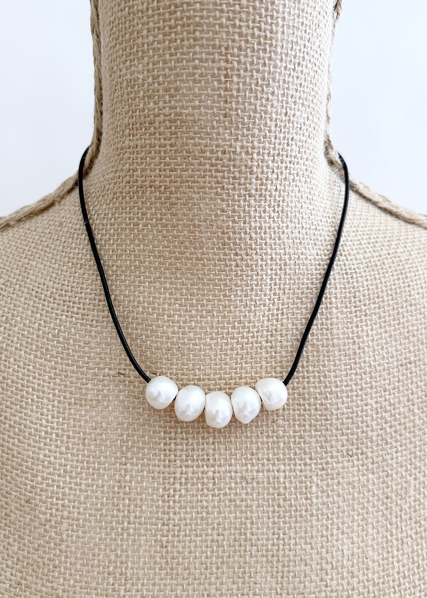 Five Large White Freshwater Pearls Floating on Black Leather secured by a Strong Magnetic Clasp for Easy wear. On Bust