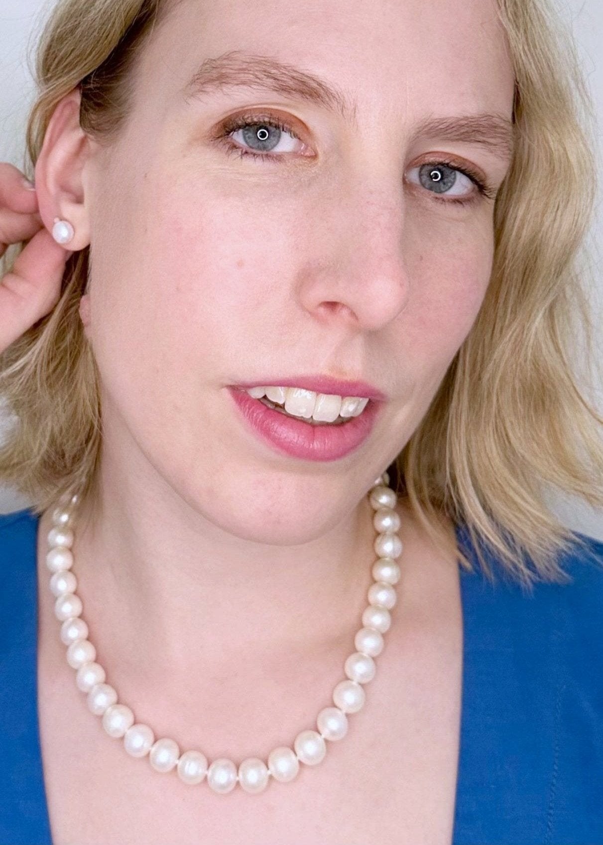 Large (11-12mm) Lustrous White Freshwater Pearl Necklace with Bean Clasp for Easy Wear. On Model