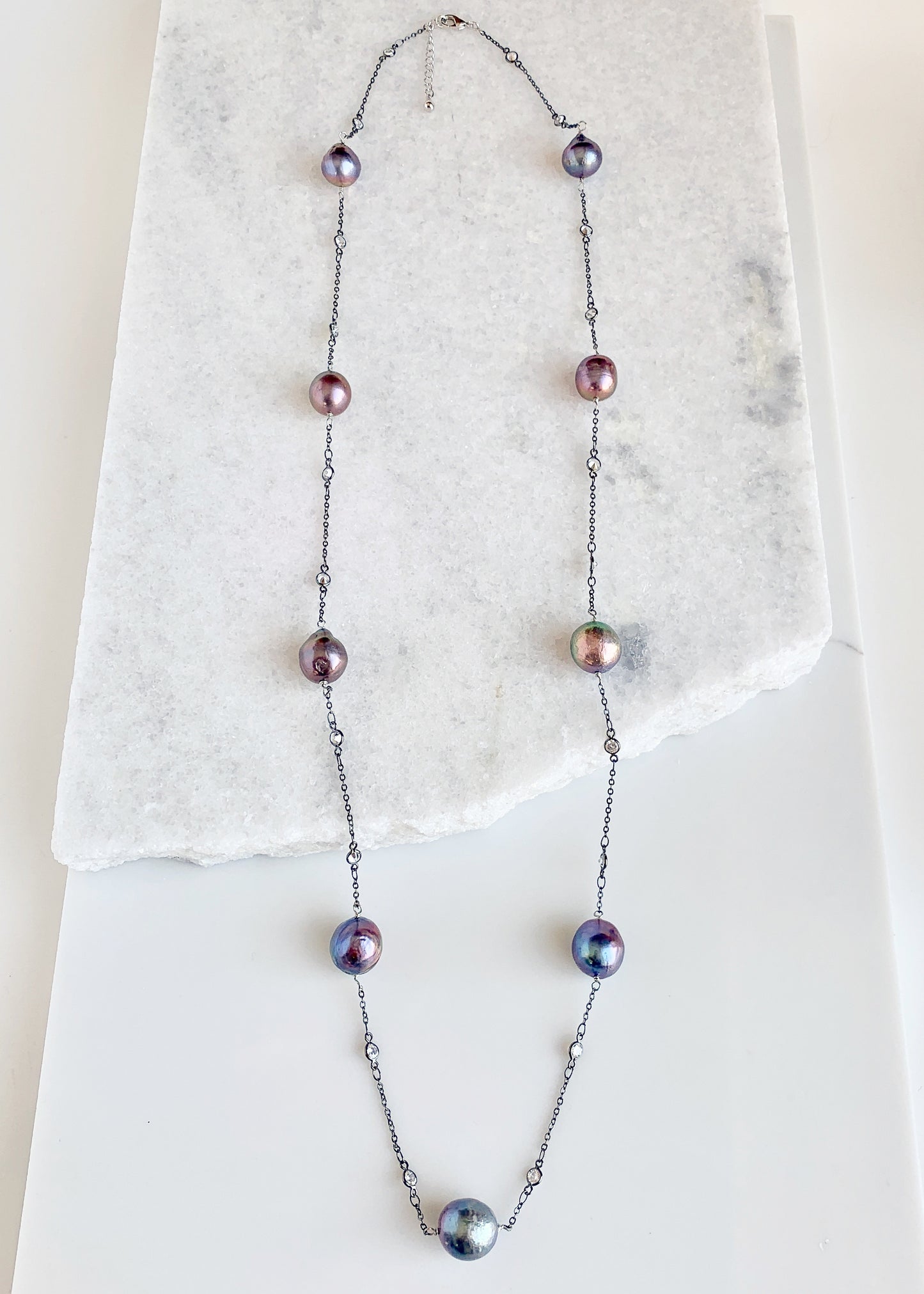 Long (36”) Necklace with Large Edison Freshwater Pearls on Gunmetal Chain with Crystal Links.  A Lobster Claw Clasp with a 1.5