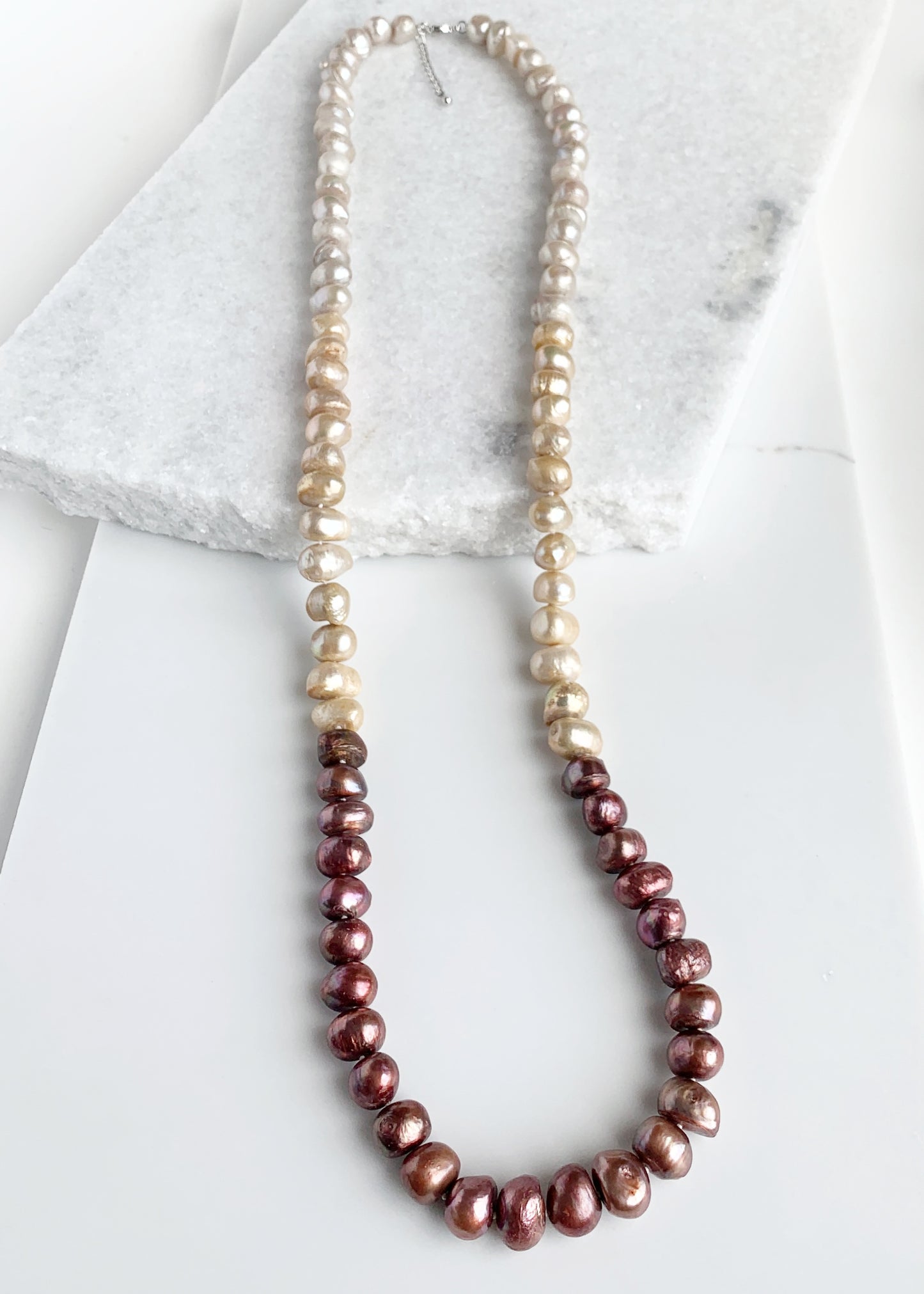 Large (12mm) Lustrous Brown Ombre Freshwater Pearls Knotted on a Long (36”) Necklace that allows for Single or Doubling Up. It is Completed with a Lobster Claw Clasp for Easy, Reliable Wear.