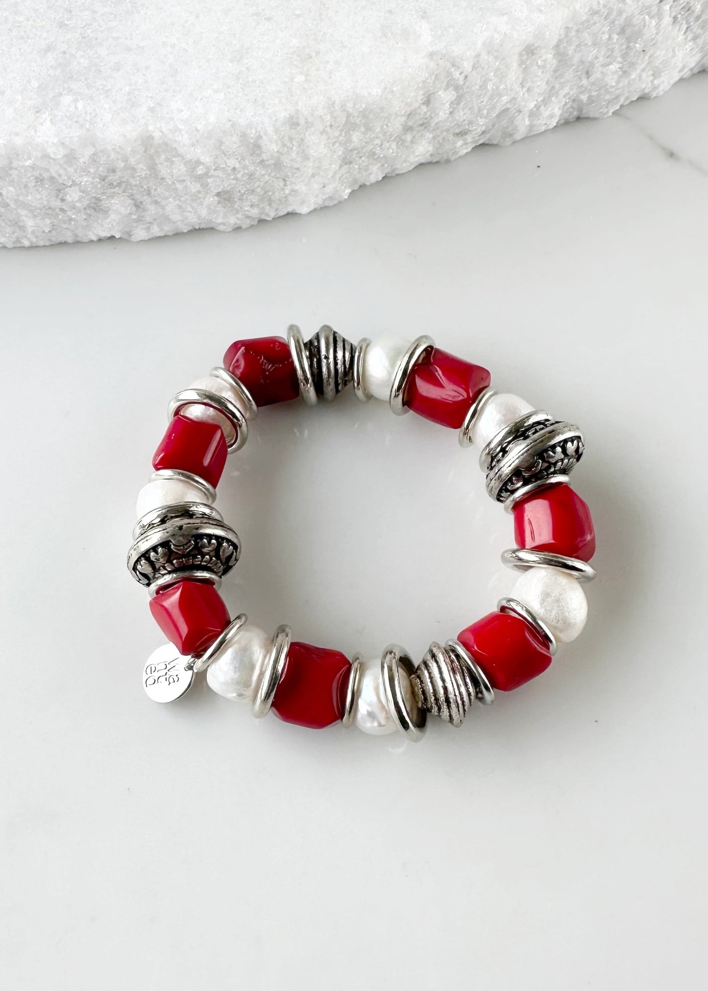 Lustrous Baroque Freshwater Pearls, Large Semi-Precious Stones, Metal Beads and Silver Bands make up this Stretch Bracelet (approx. 7”) in Three Different Colour Combinations. Red and White (for Canada) are Highlighted