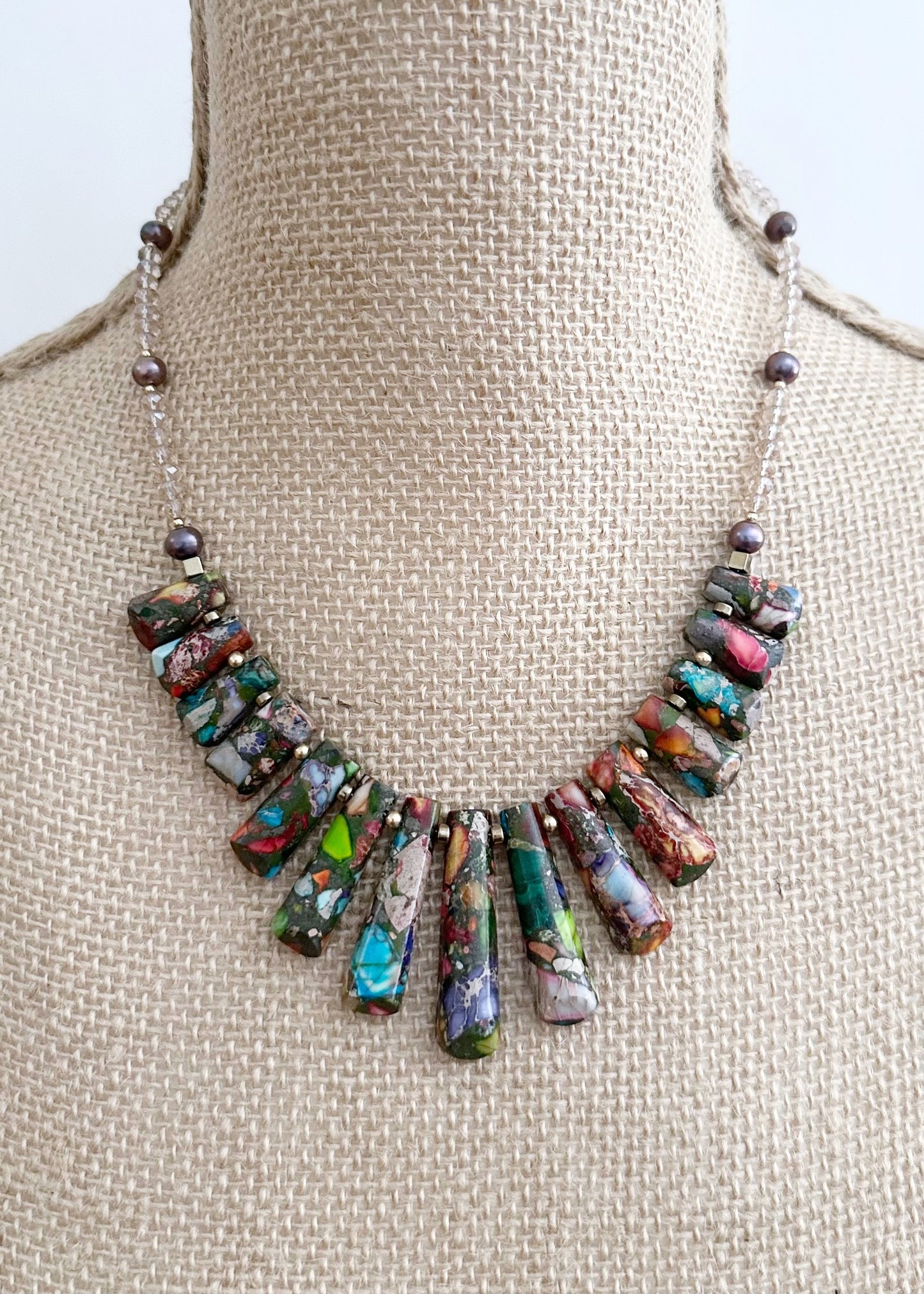 This Limited Edition 18” Necklace Boasts Vibrant Impression Jasper, Beautiful Freshwater Pearls, Crystal, Plated Hematite and Gold-Filled Beads completed with a Gold-Filled Spring Ring Clasp.