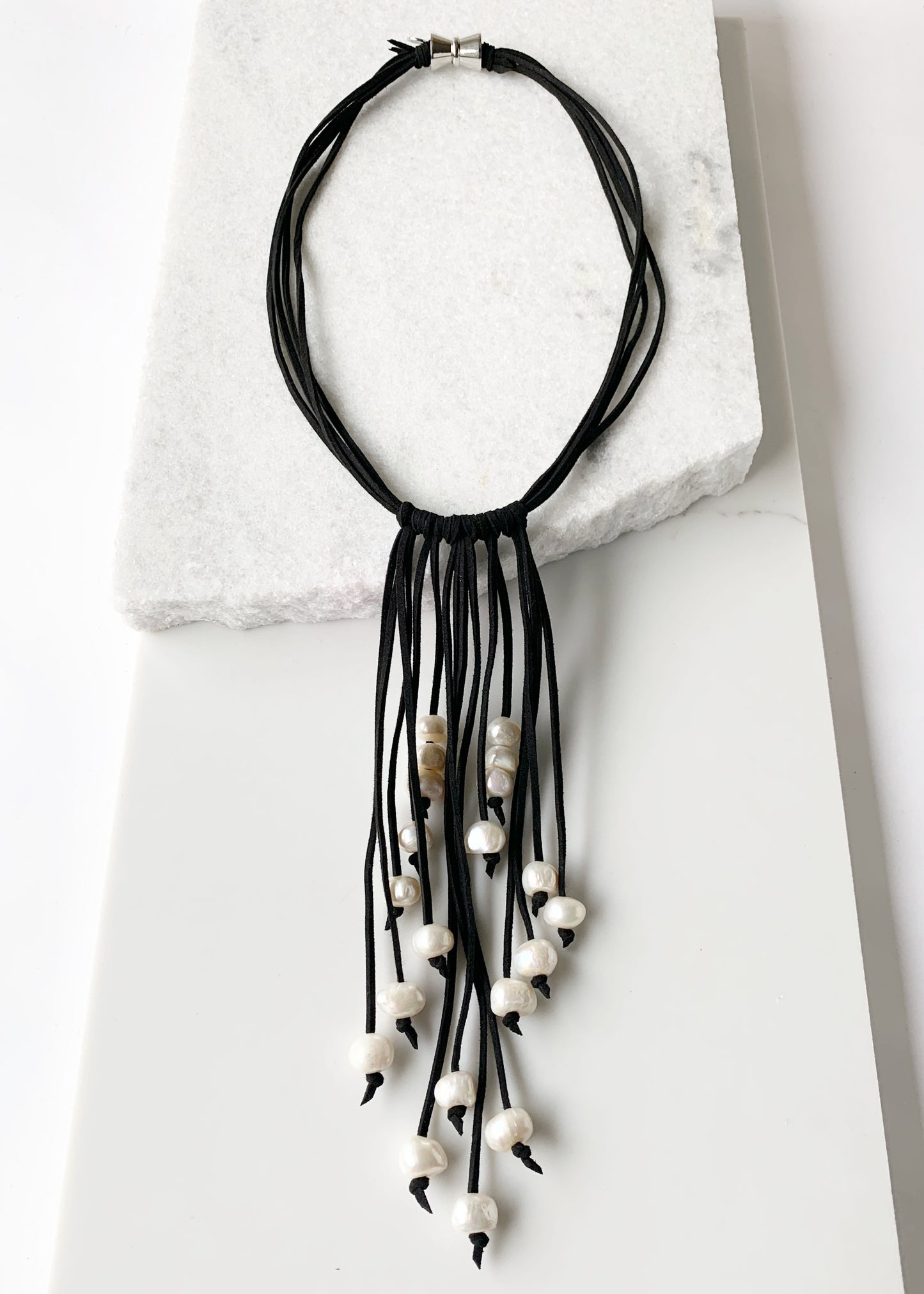 Large Baroque White Freshwater Pearls on Various-Length Strands with Black Vegan Suede and Leather Necklace Completed with a Strong Secure Magnetic Clasp for Easy Wear.
