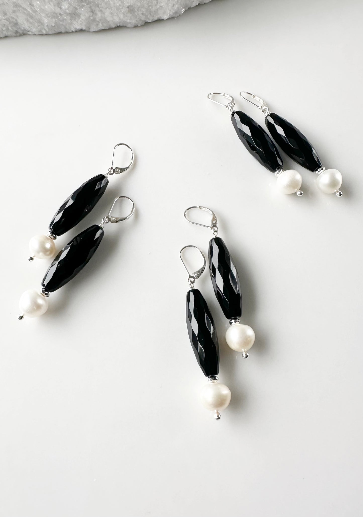 Large White Freshwater Pearls with Long Faceted Onyx with Sterling Silver Headpins and Lever Backs. Three Shown