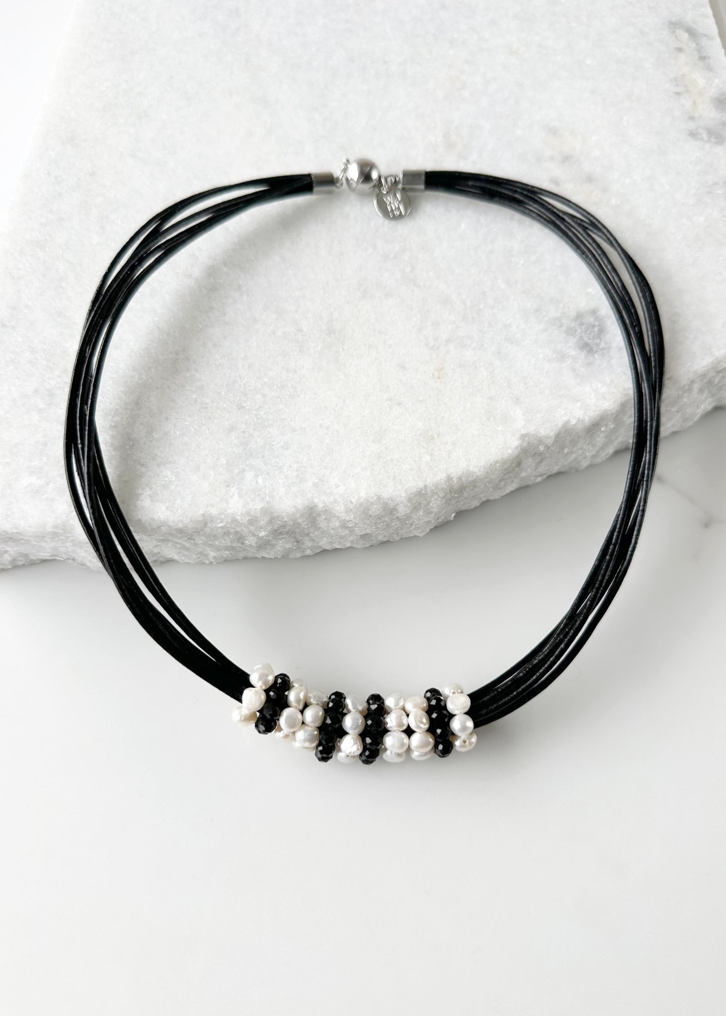 Pretty Baroque White Freshwater Pearl and Crystal Rings Float on Strands of Black 18” Long Leather in this Necklace, Finished by a Strong Secure Magnetic Clasp for Easy Wear.