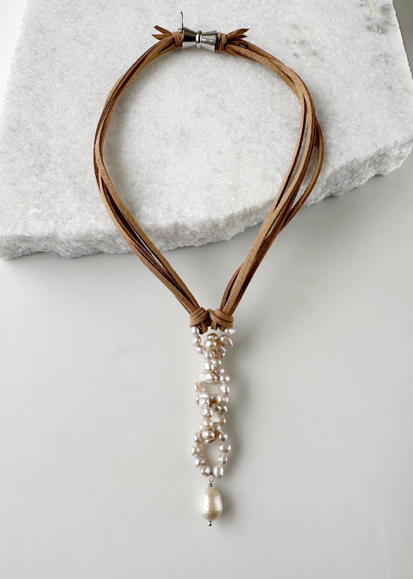 Modern Fun Look with Champagne Freshwater Pearl Links and Baroque Pearl Drop Hanging from Four Strands of Beige Vegan Suede Completed with a Strong Secure Magnetic Clasp for Easy Wear.