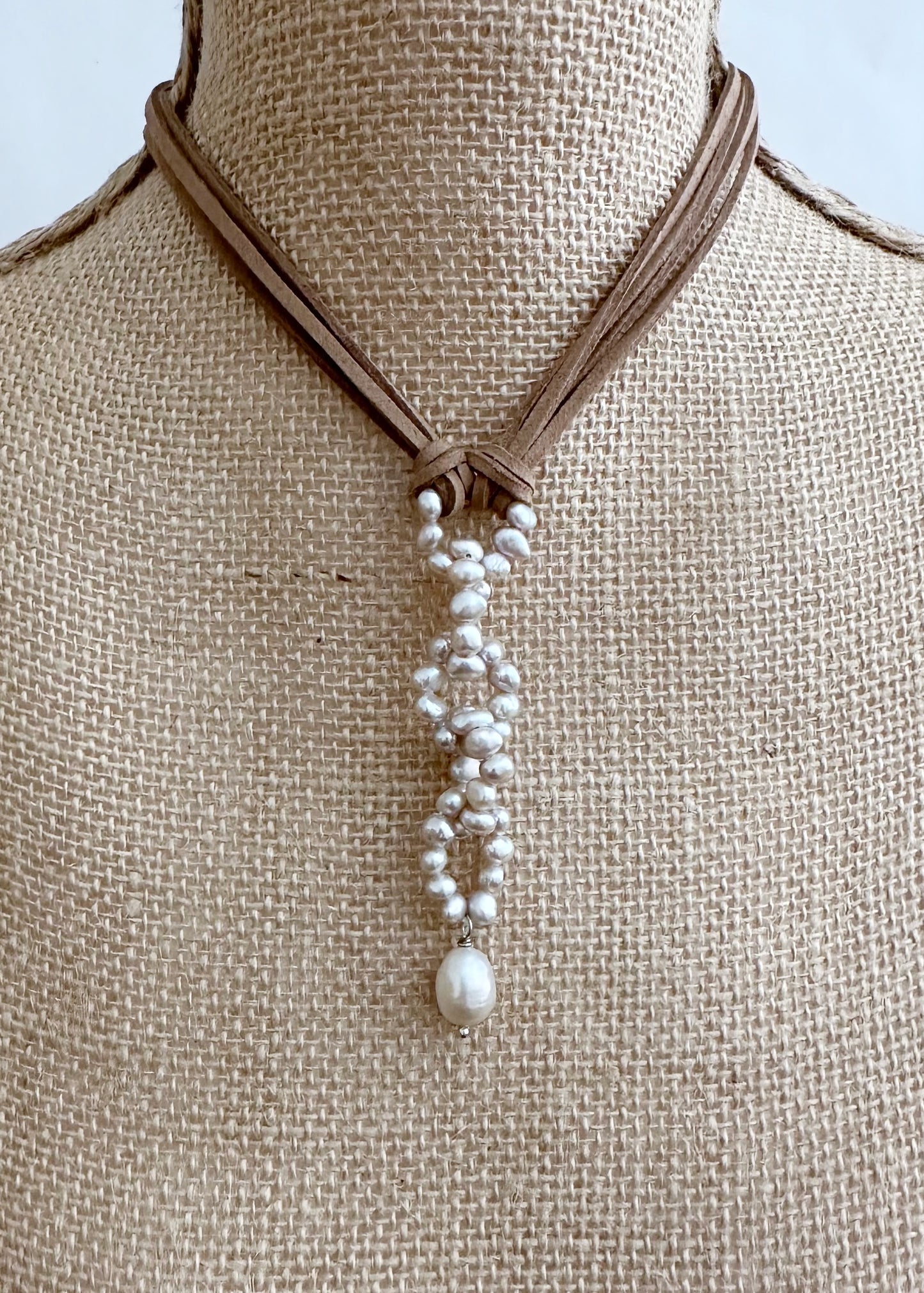 Modern Fun Look with Champagne Freshwater Pearl Links and Baroque Pearl Drop Hanging from Four Strands of Beige Vegan Suede Completed with a Strong Secure Magnetic Clasp for Easy Wear. On Bust