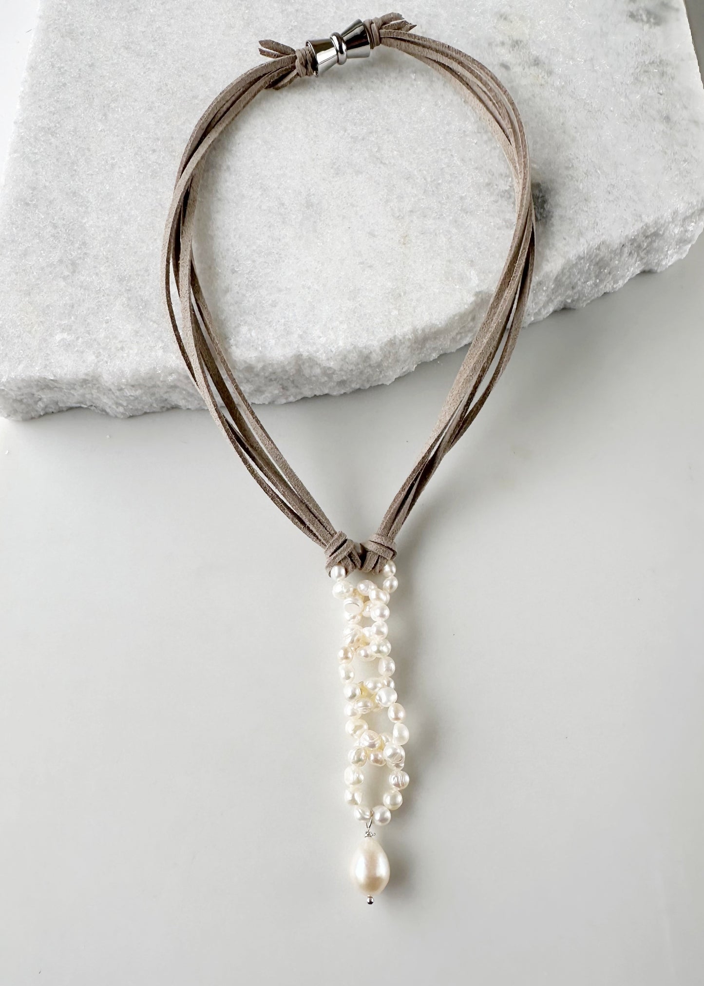 Modern Fun Look with White Freshwater Pearl Links and Baroque Pearl Drop Hanging from Four Strands of Grey Vegan Suede Completed with a Strong Secure Magnetic Clasp for Easy Wear.