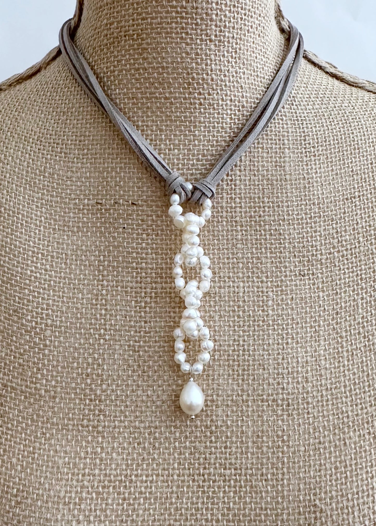 Modern Fun Look with White Freshwater Pearl Links and Baroque Pearl Drop Hanging from Four Strands of Grey Vegan Suede Completed with a Strong Secure Magnetic Clasp for Easy Wear. O Bust