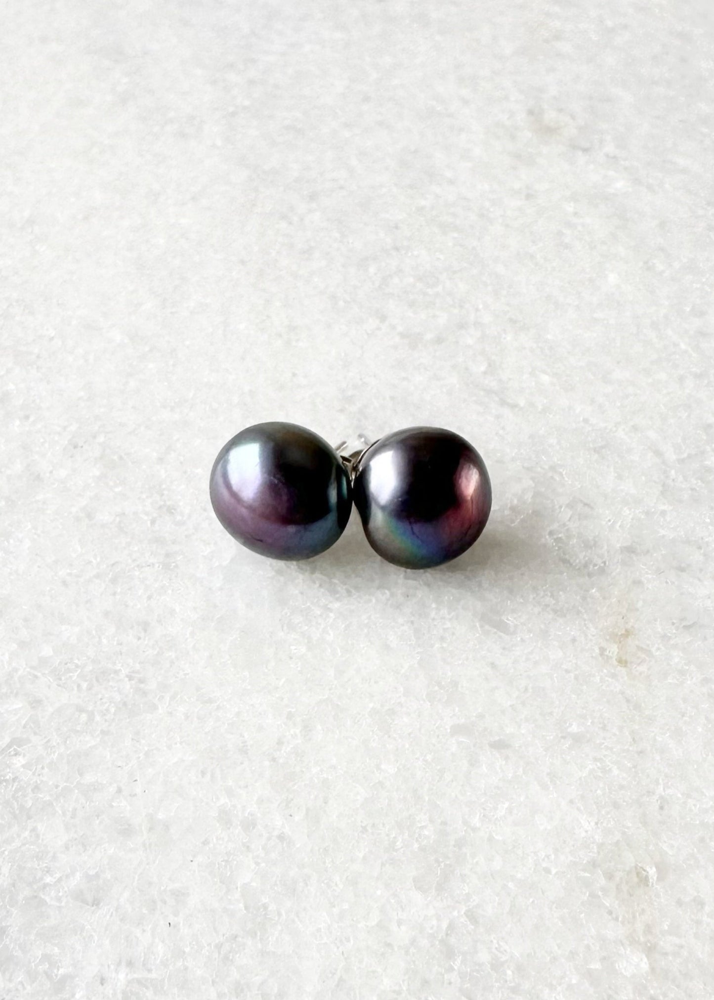 These Pretty Black 10-11mm Freshwater Pearl Stud Earrings are on Sterling Silver Post and Butterfly.  A Fan Favorite!