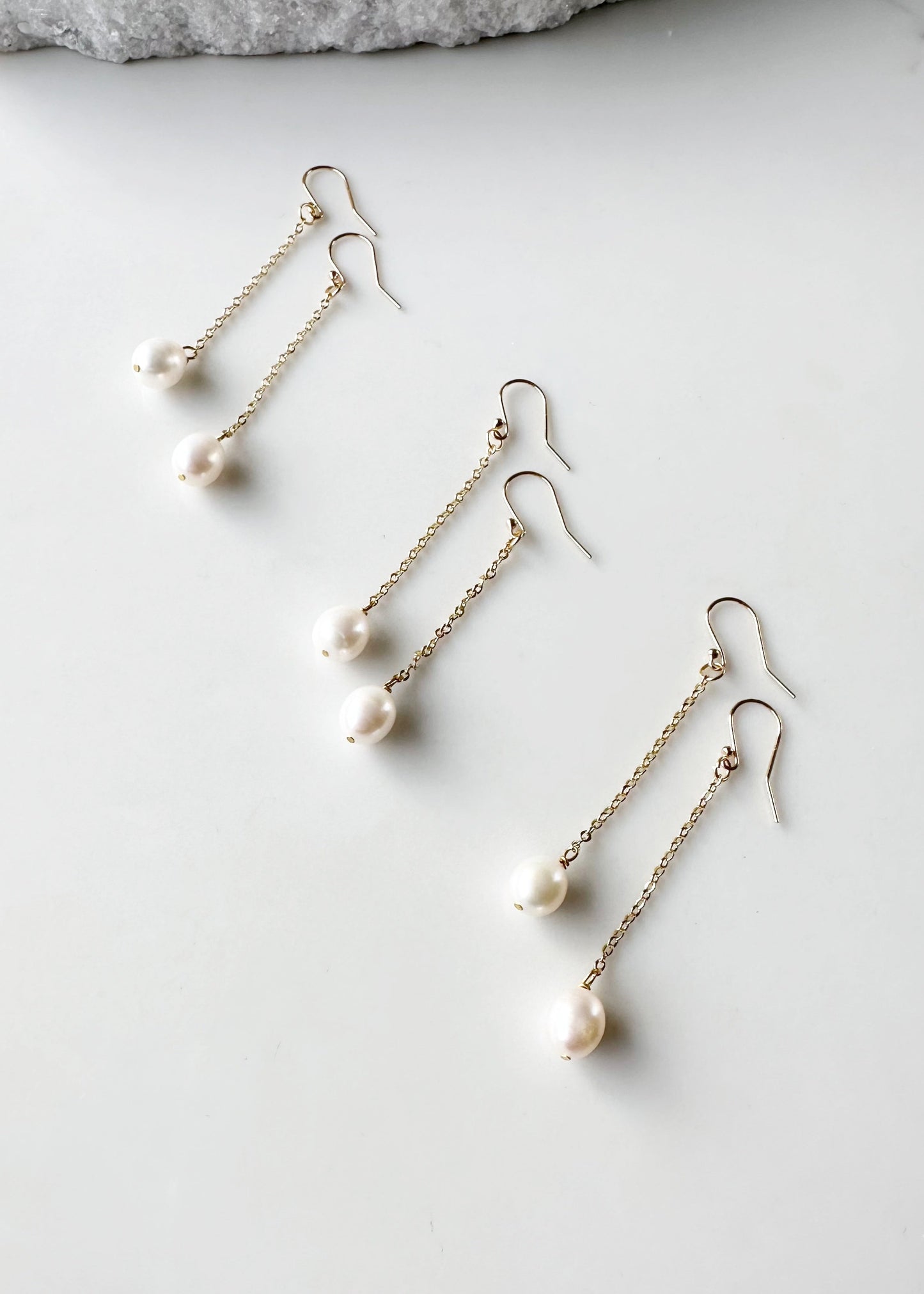 2.5” Delicate Gold-Plated Chain and Freshwater Pearl Drop Earring on Gold-Plated Hooks. Three Shown