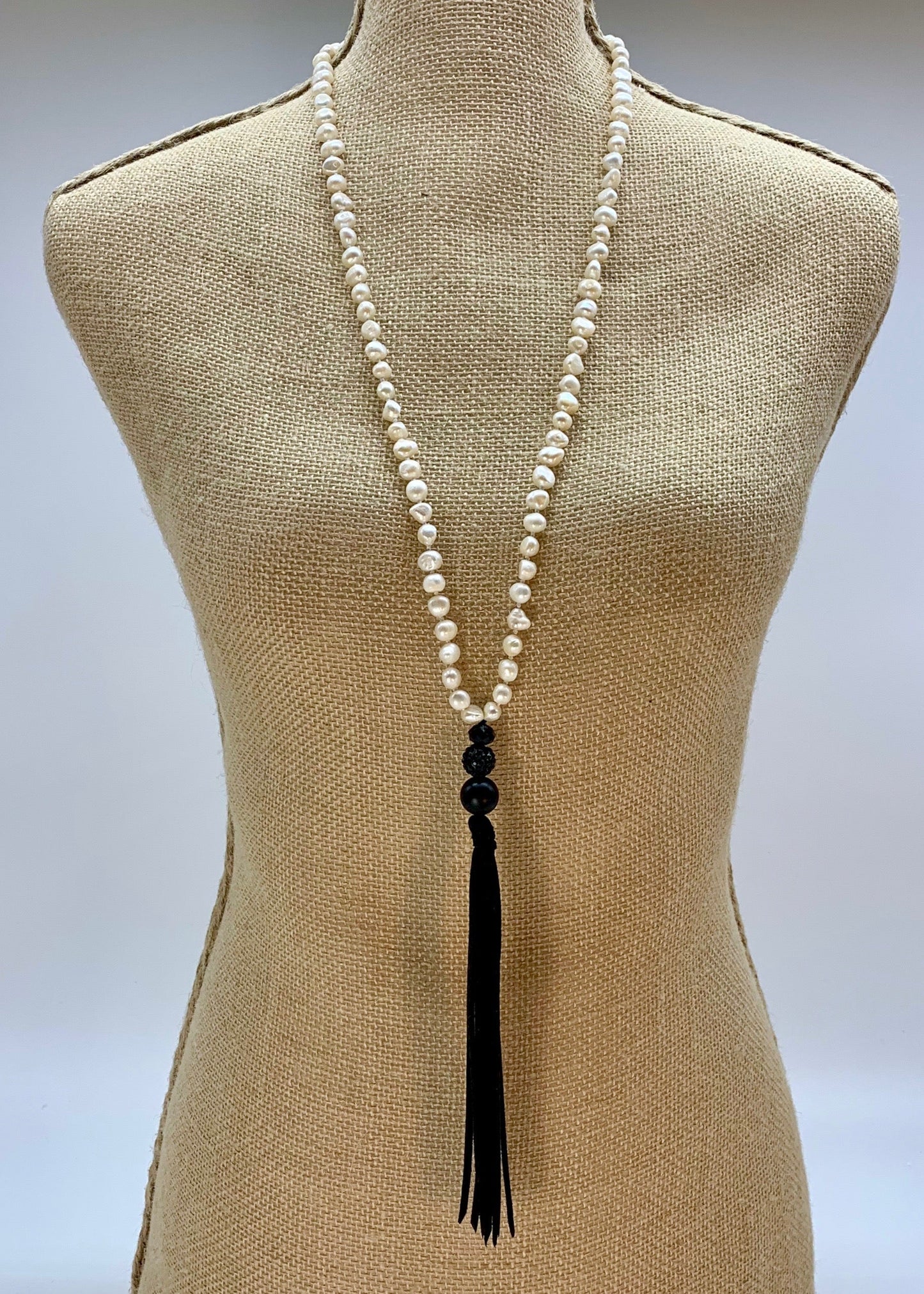 Freshwater Baroque White 8-9mm Pearls with Agate and Crystal and a Vegan Suede Tassel in Long 23” Necklace. Great on its own or Layered. on Bust