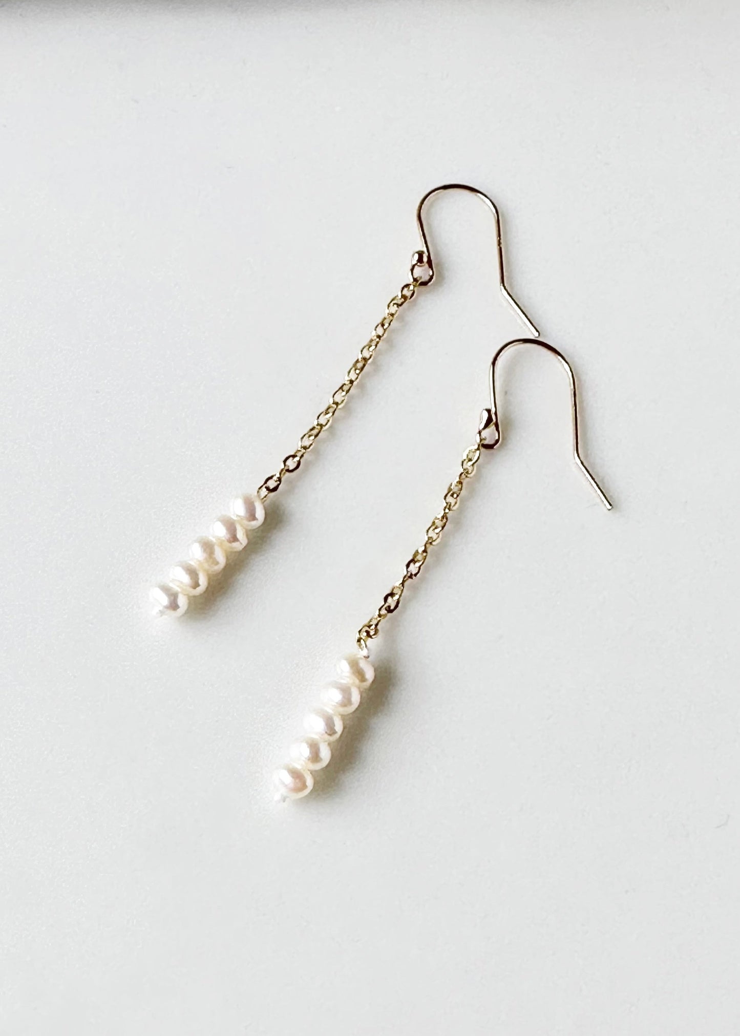 Stack of Five 3mm Freshwater Pearls On Delicate Gold-Plated Chain and Hooks in 2.5” Earring.