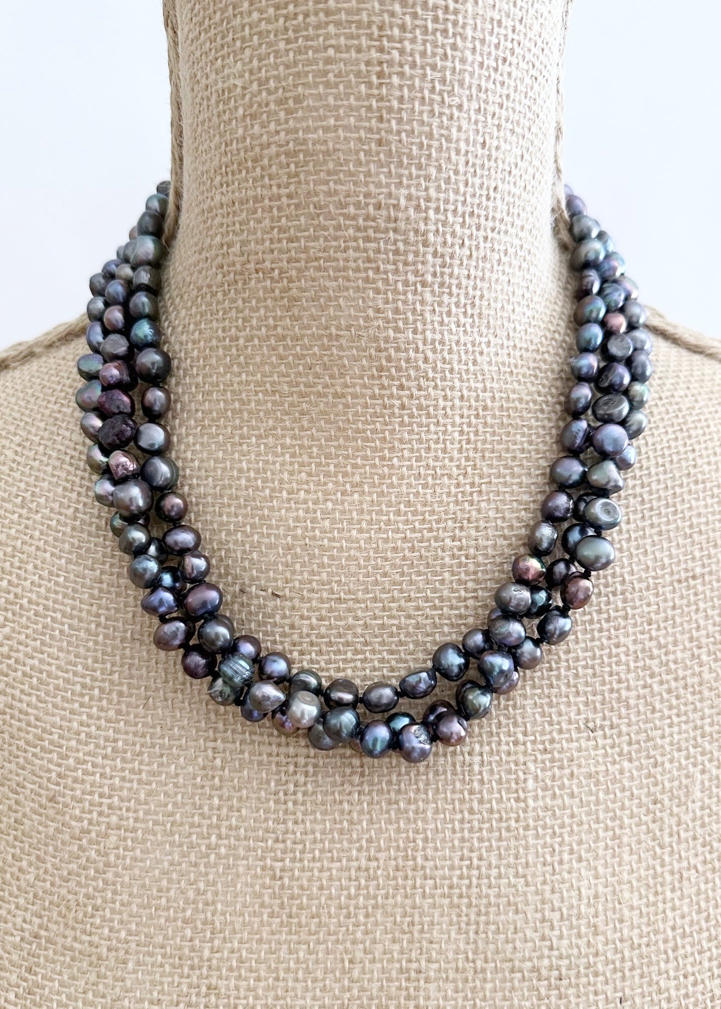 Three Strands of Knotted 8-9mm Black Freshwater Baroque Pearls with a Strong Secure Magnetic Clasp for Easy Wear. On Bust