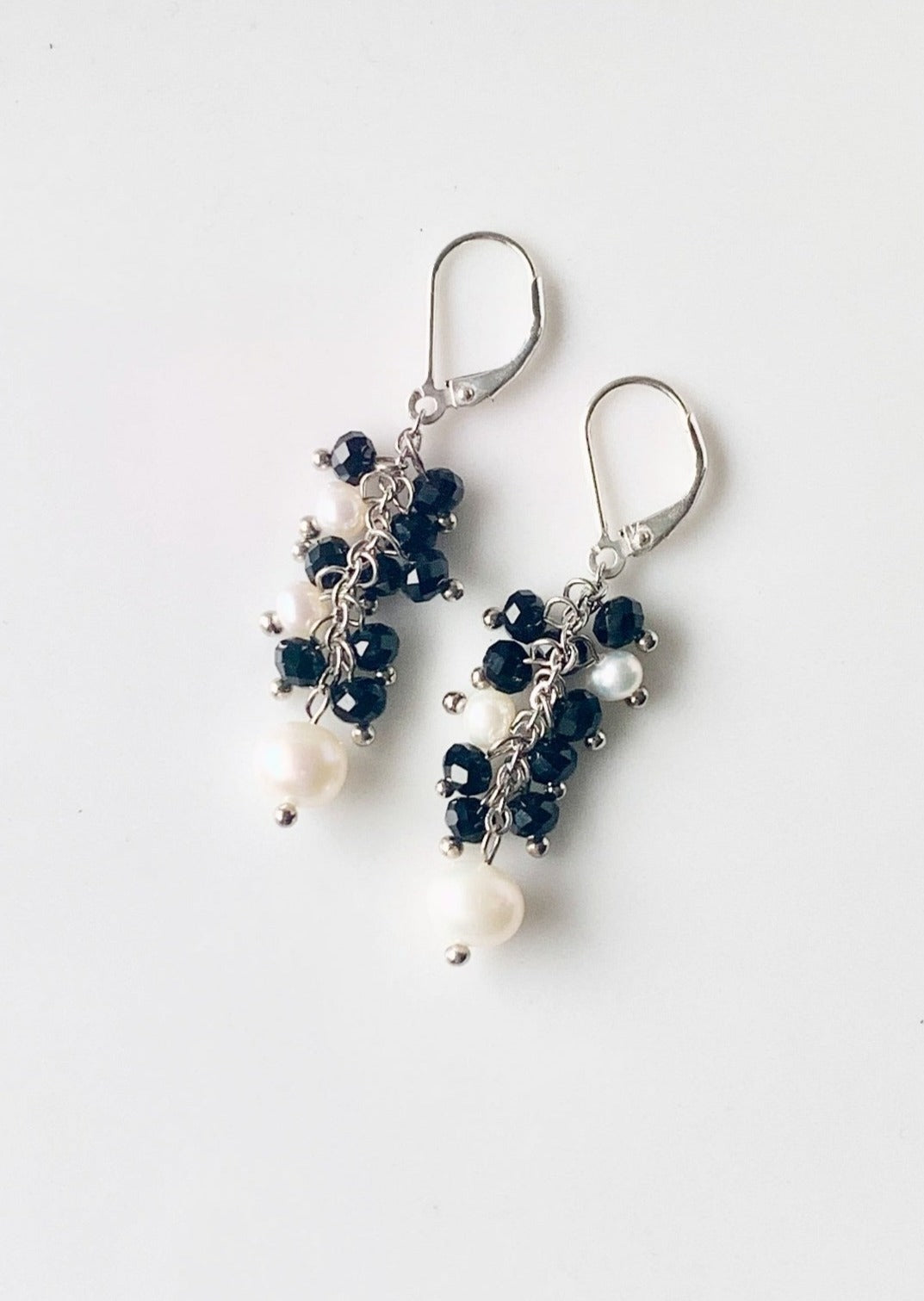 Delicate Cluster of White Freshwater Pearls and Black Crystals Hanging from Sterling Silver Lever Backs in this 1.75” Earring.