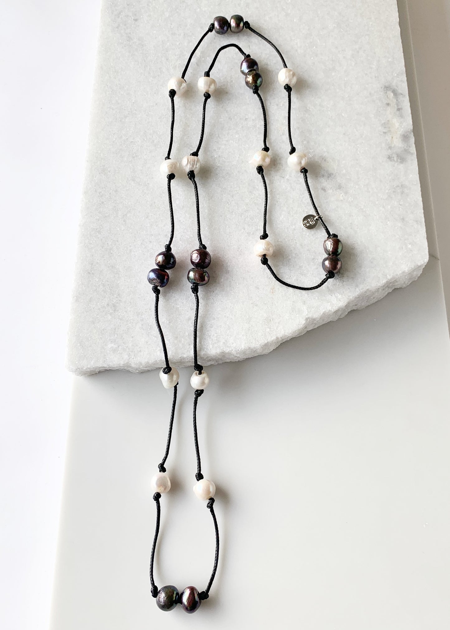 Freshwater Baroque Pearls Knotted on Black Cord in 24” Necklace that Can be Worn Long or Doubled.