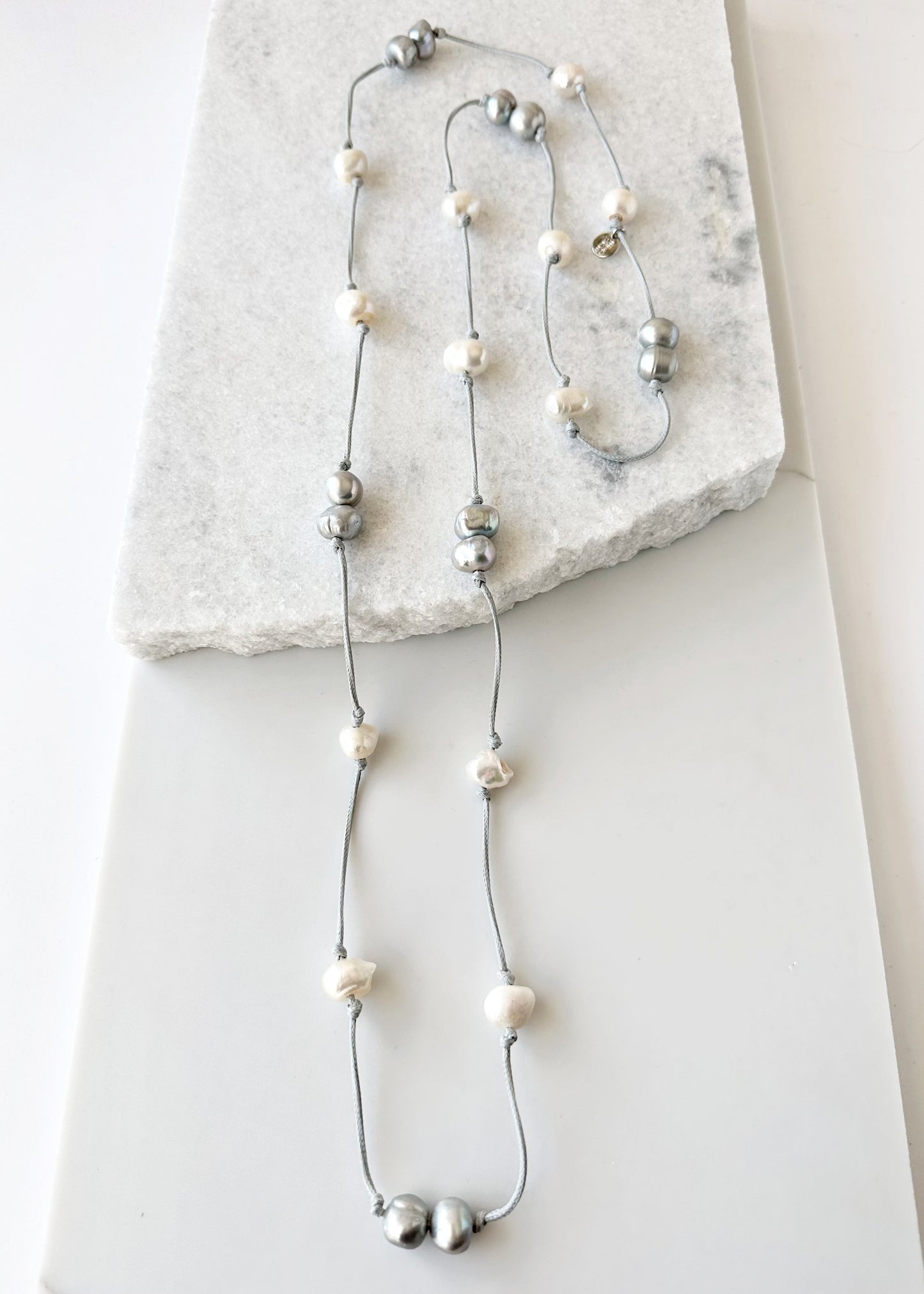 Freshwater Baroque Pearls Knotted on Grey Cord in 24” Necklace that Can be Worn Long or Doubled.