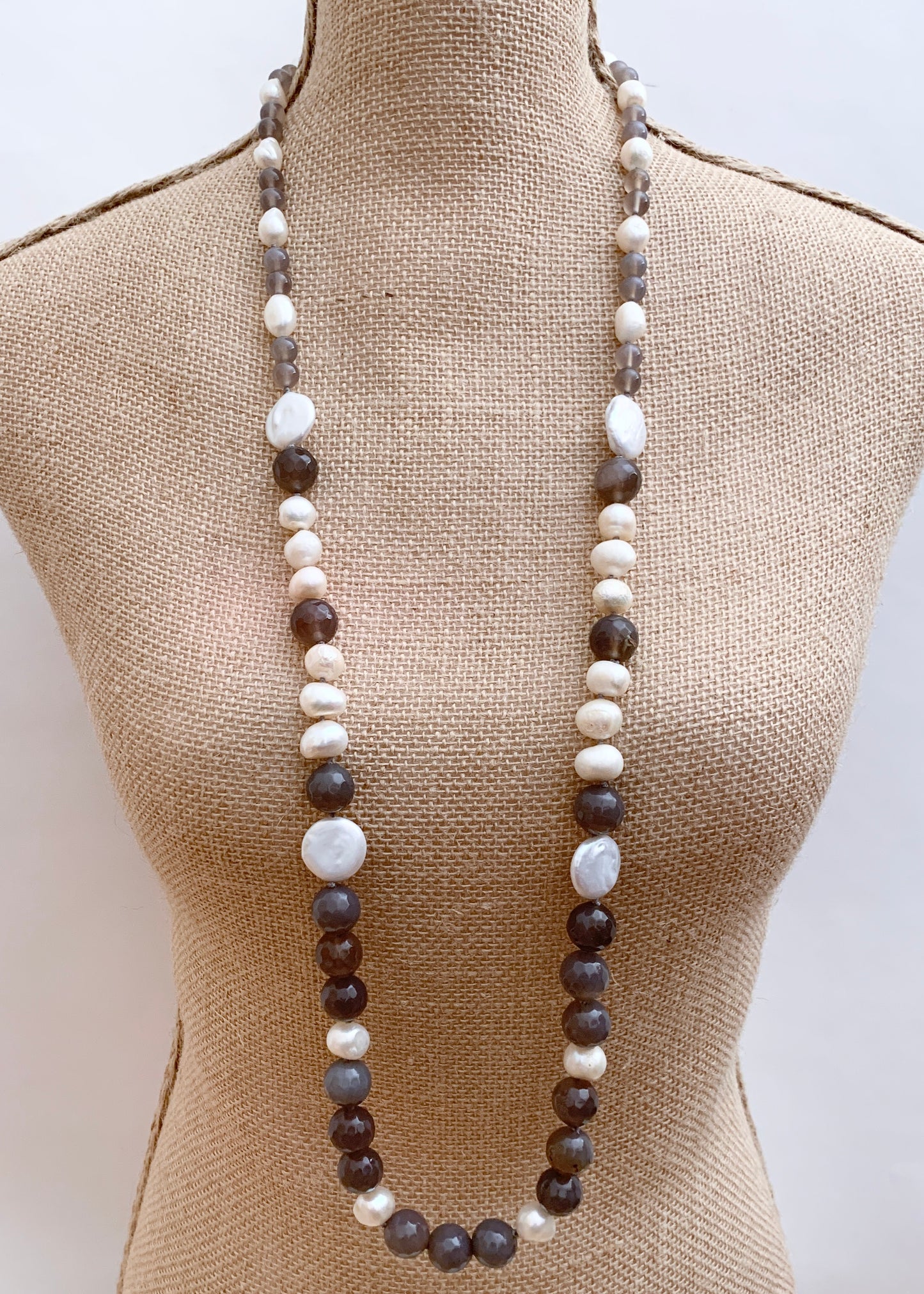 Large White Baroque and Coin Freshwater Pearls Adorn this Necklace with 8-14mm Faceted Grey Agate. On Bust