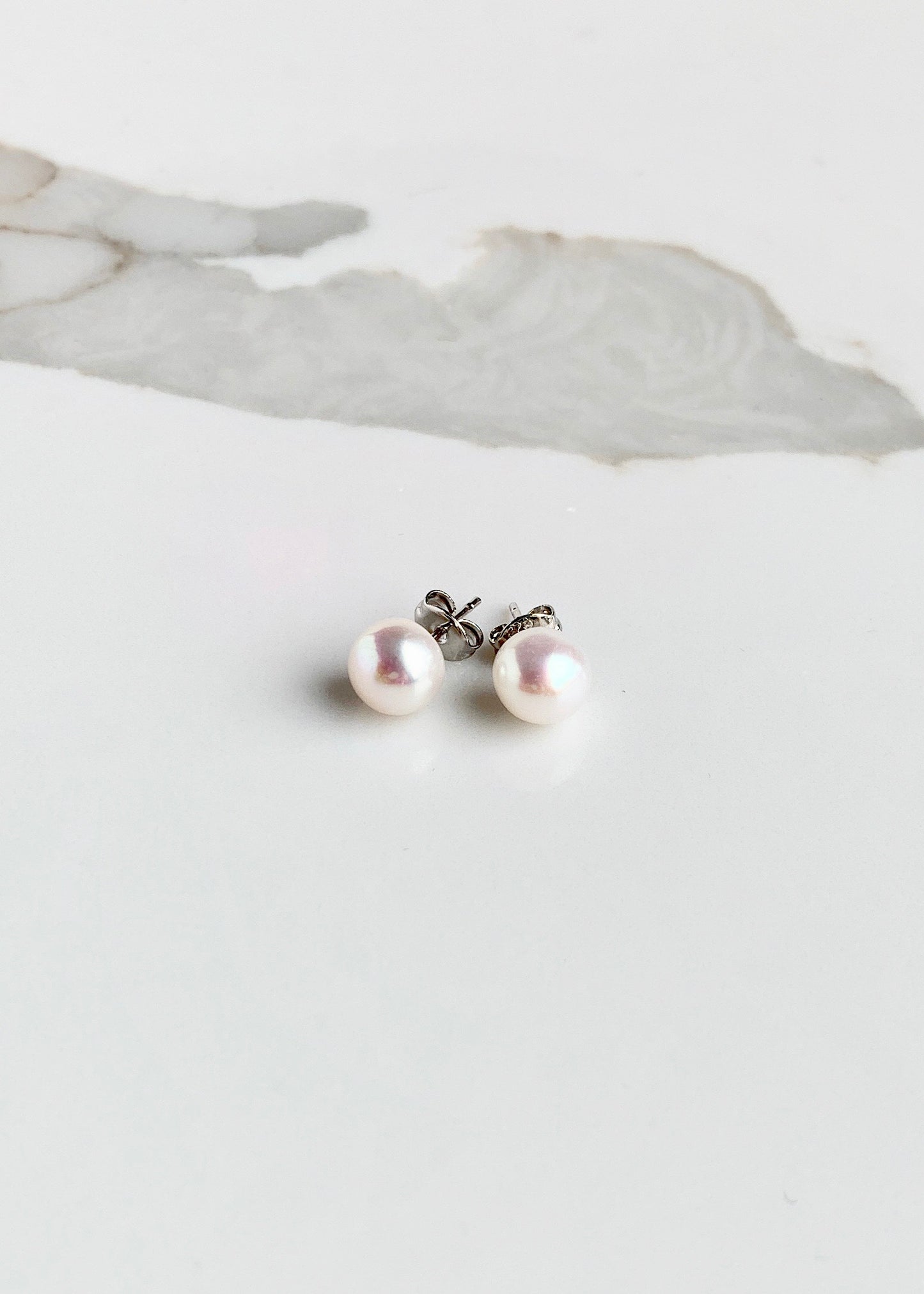 These Pretty Pink 8mm Freshwater Pearl Stud Earrings are on Sterling Silver Post and Butterfly.  A Fan Favorite!