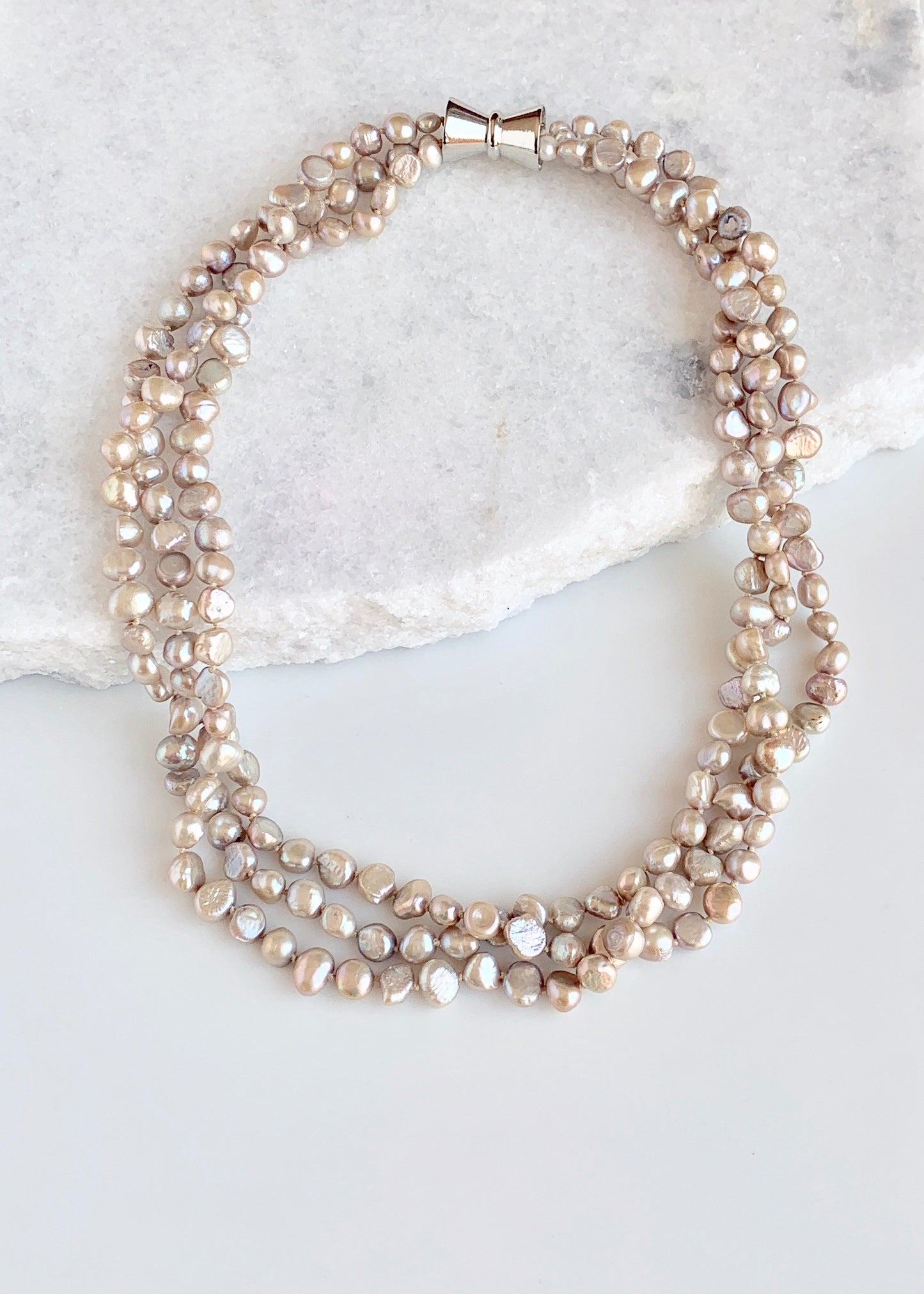 Three Strands of Knotted 8-9mm  Champagne Freshwater Baroque Pearls with a Strong Secure Magnetic Clasp for Easy Wear.