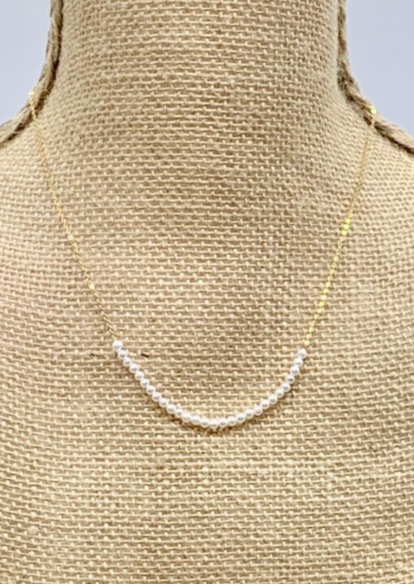 3mm Freshwater White Pearls on Yellow Gold 18” Chain with 1.25” Extender for this Delicate and Classic Necklace which can also be Worn Layered with other Favorites.  On Bust