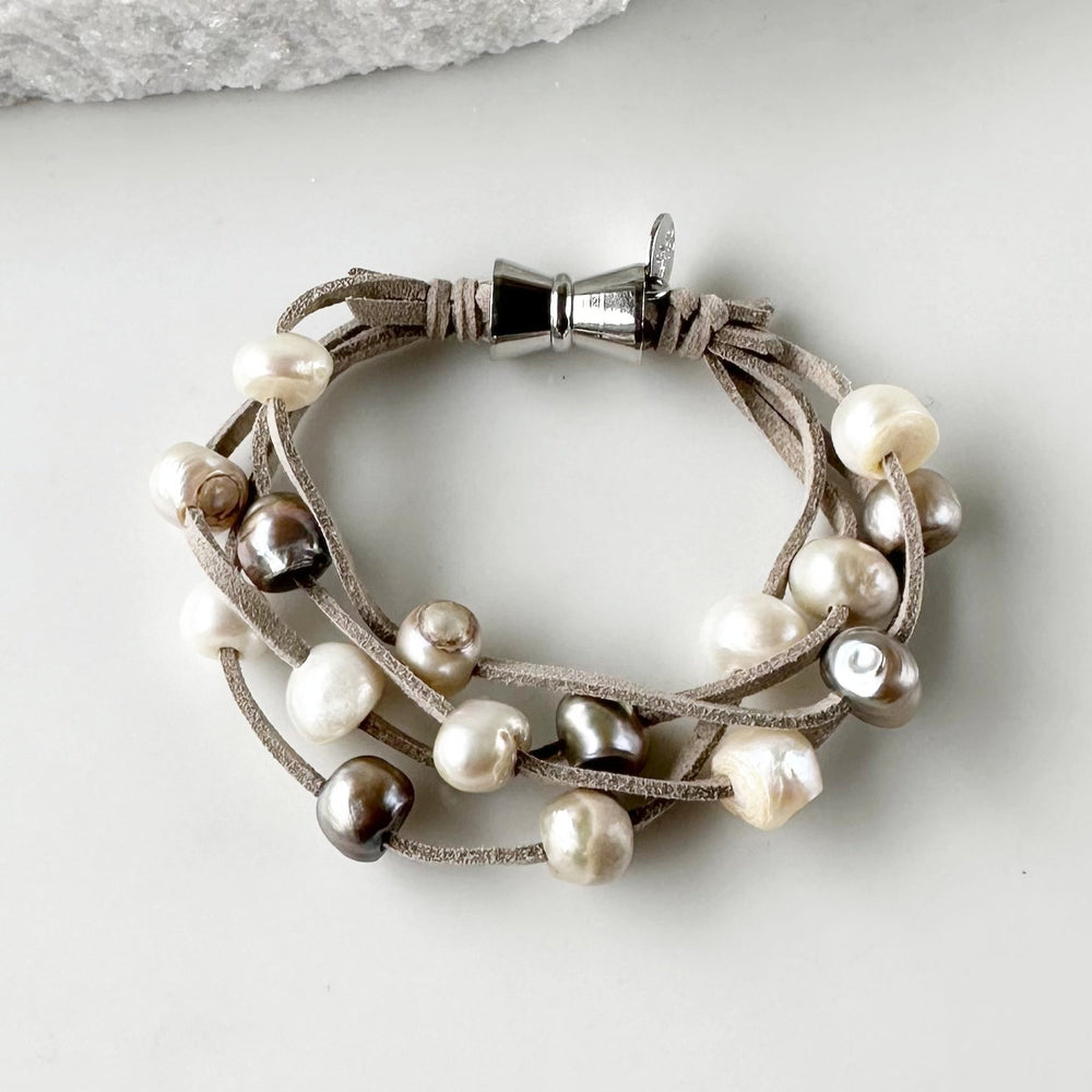 
                      
                        Mix of Freshwater Pearls on Light Grey Vegan Suede Bracelet with Strong Secure Magnetic Clasp for Easy Wear
                      
                    