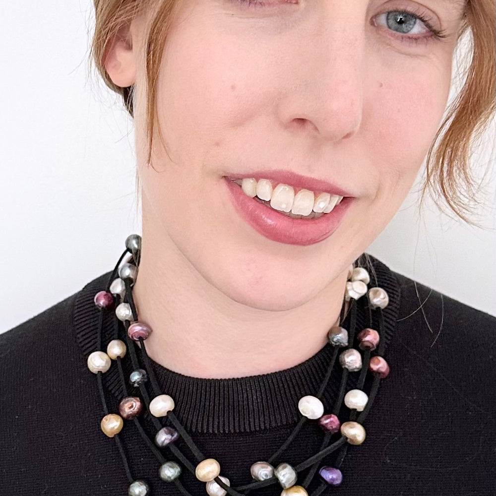 
                      
                        Four Strands of Multi-Coloured Freshwater Pearls on Black Vegan Suede with Secure, Strong Magnet for Easy Wear
                      
                    