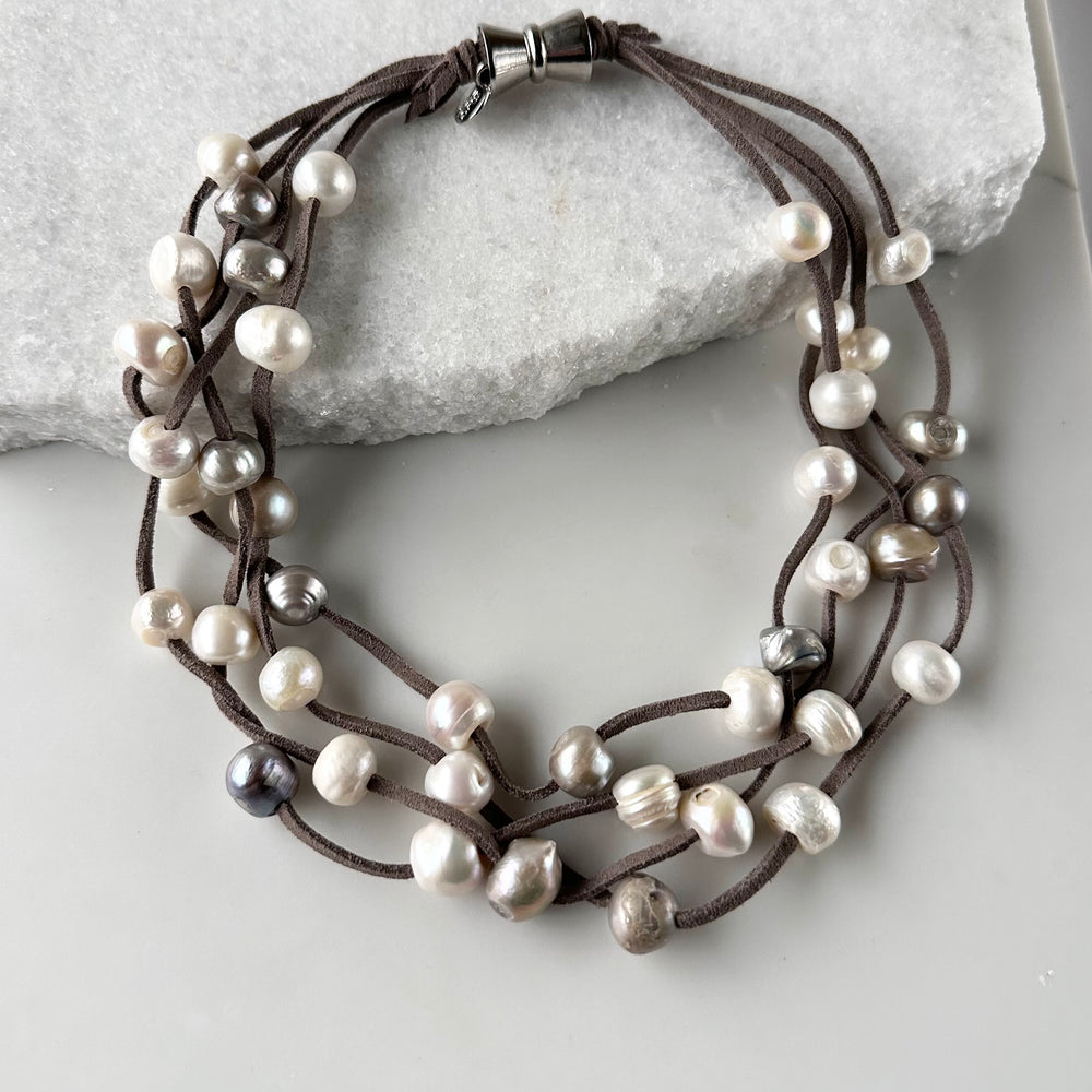 
                      
                        Four Strands of White Freshwater Pearls on Dark Grey Vegan Suede with Secure, Strong Magnet for Easy Wear
                      
                    
