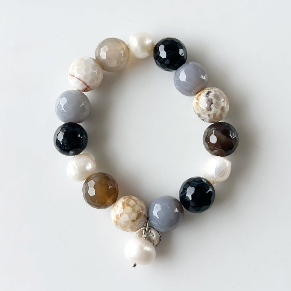 
                      
                        White Freshwater Pearl with Beige Semi-Precious Stone Mix Stretch Bracelet.  Perfect for layering!
                      
                    