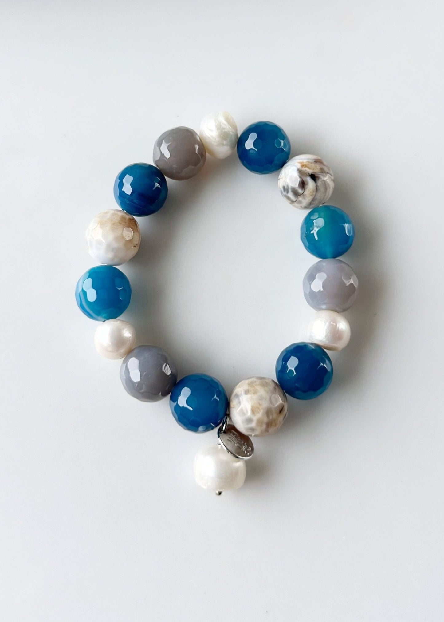 White Freshwater Pearl with Blue Semi-Precious Stone Mix Stretch Bracelet.  Perfect for layering!