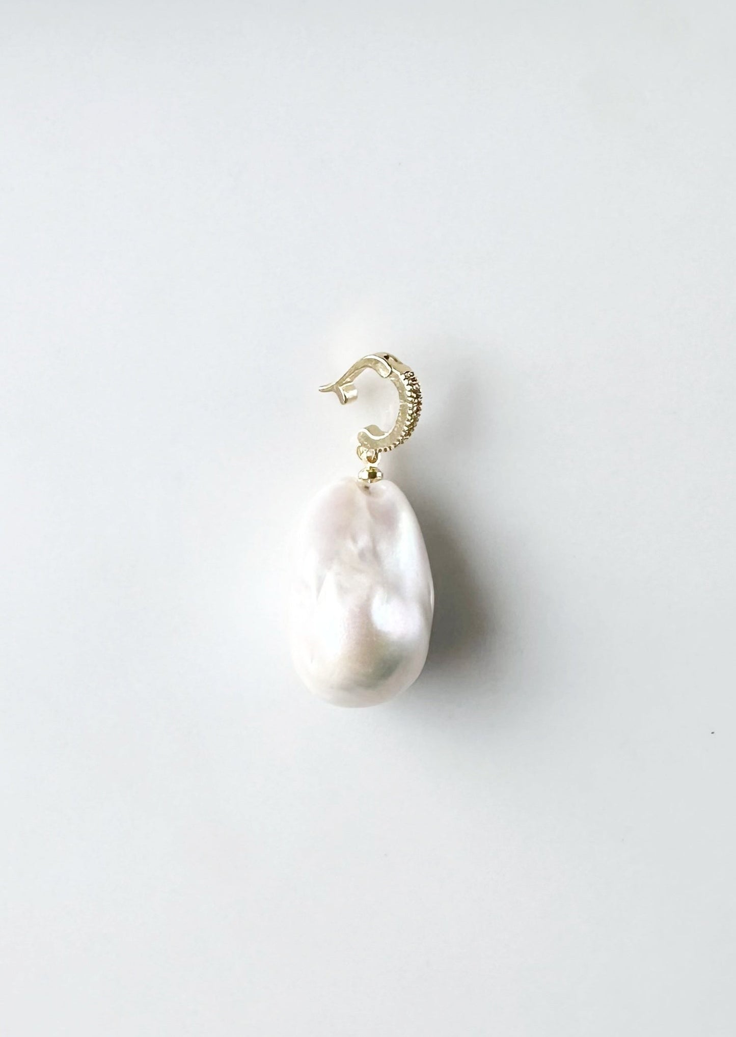 Large Baroque White Freshwater Pearl Pendant on Gold-Plated Bail(shown open) with In-Laid Cubic Zirconia.  This Clip-On Pendant allows you to wear it with many of your favorite Pearl Necklaces.