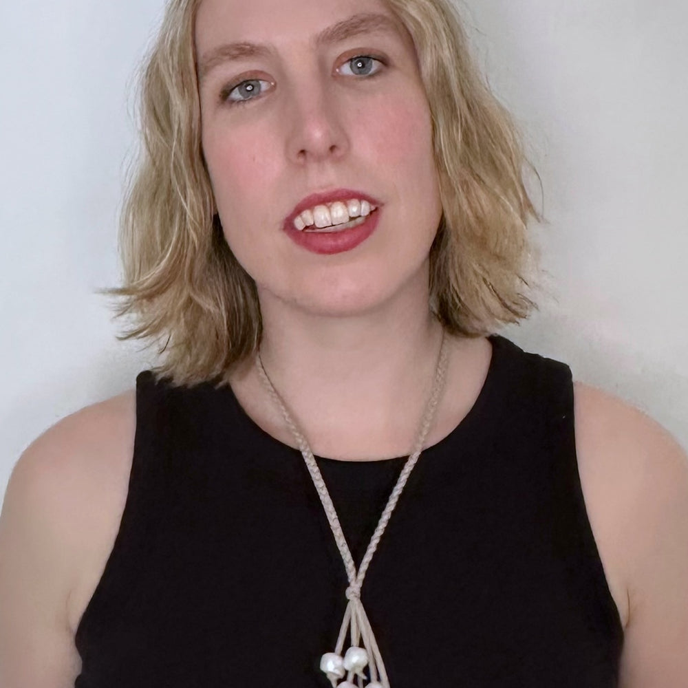 
                      
                        White Freshwater Pearl Necklace on Braided Grey Vegan Suede.  Strong Secure Magnetic Clasp for Easy Wear. Shown on Model
                      
                    