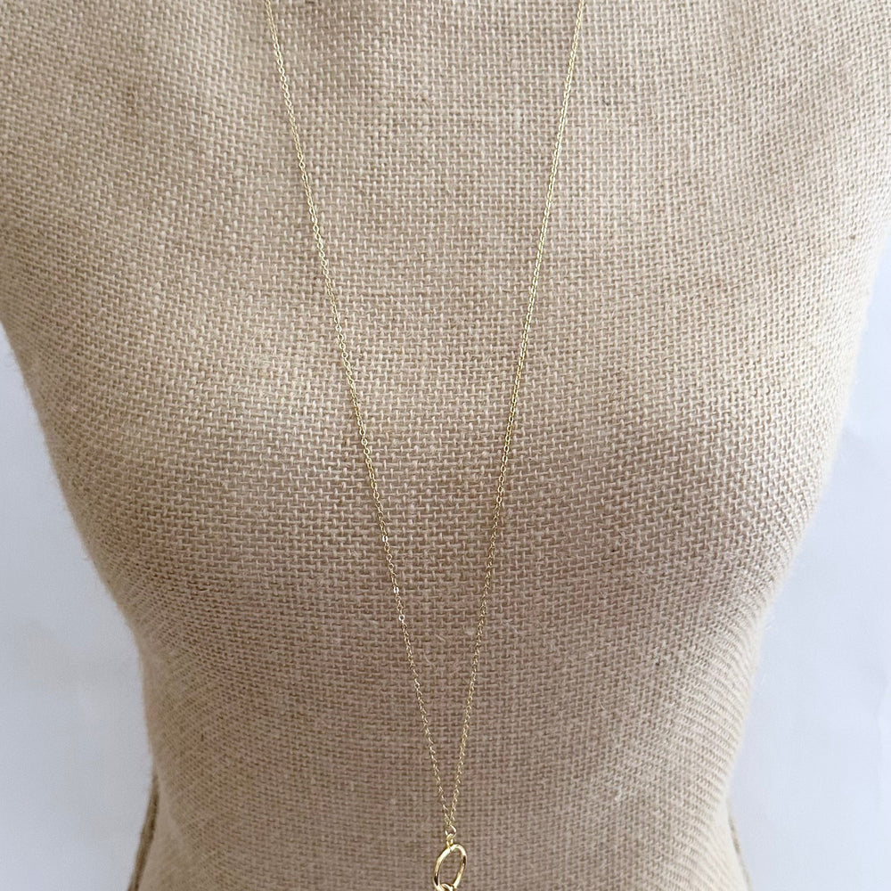 
                      
                        Extra Large White Baroque Freshwater Pearl on Long Gold-Plated Chain.
                      
                    