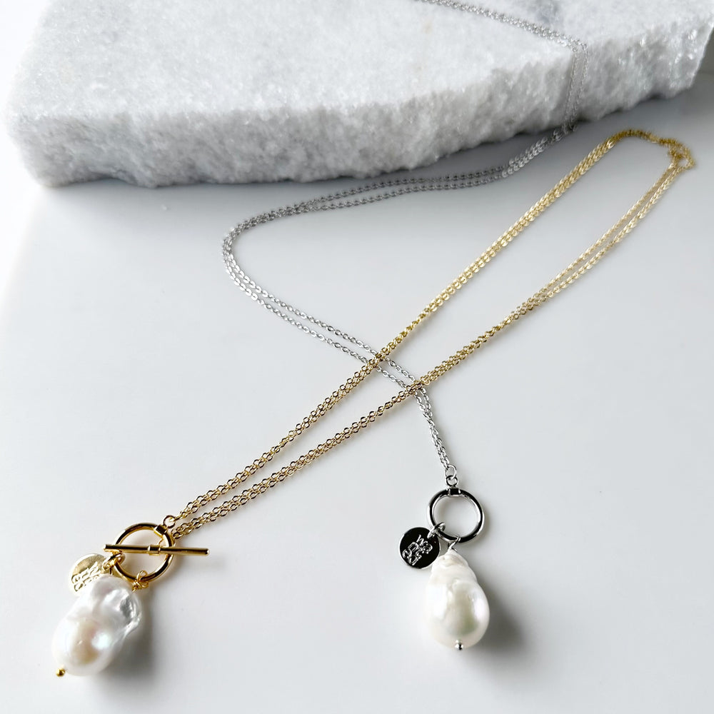 
                      
                        Extra Large White Baroque Freshwater Pearl on White and Yellow Gold-Plated Chains. Two Varieties shown
                      
                    