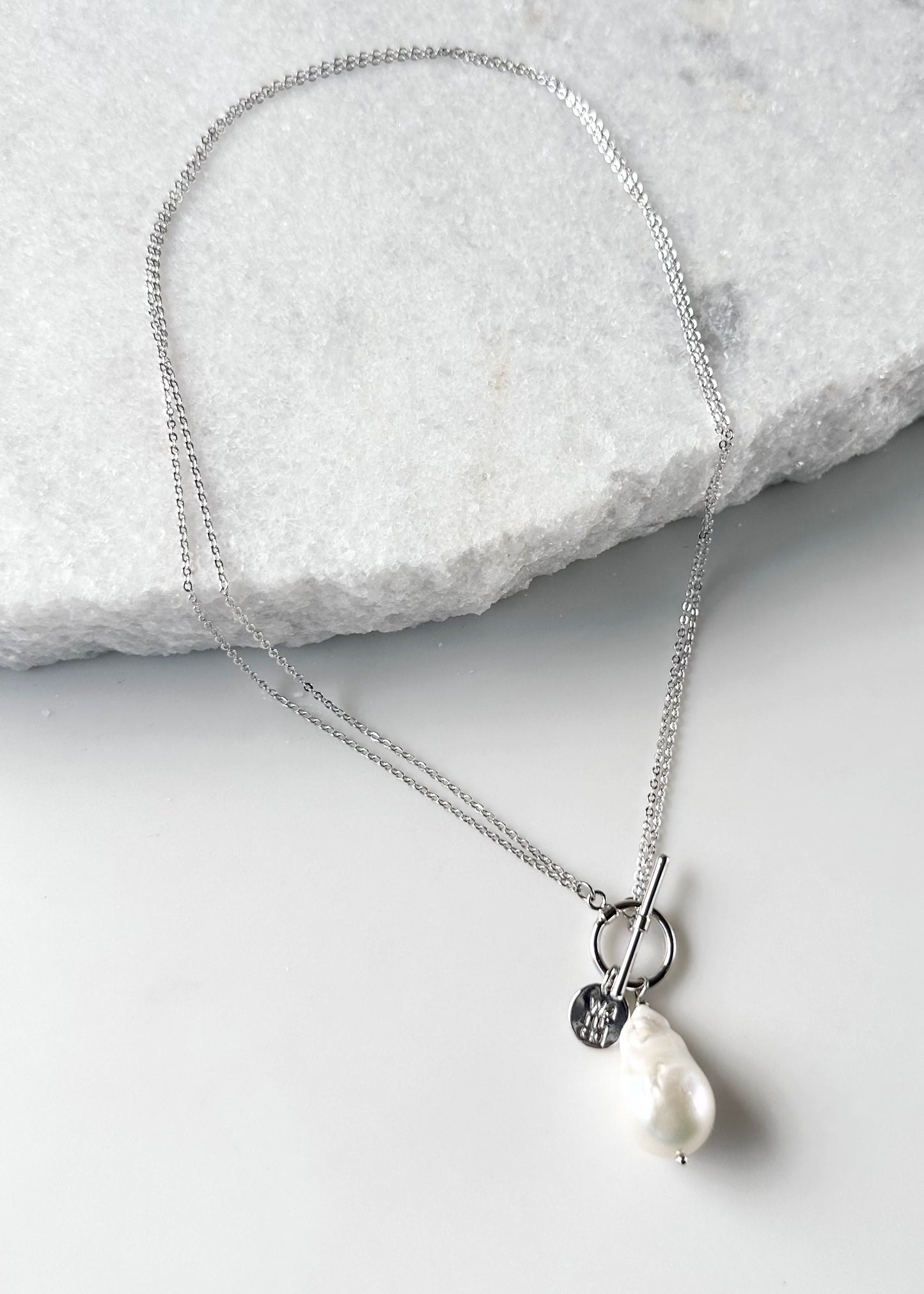 Extra Large White Baroque Freshwater Pearl on White Gold-Plated Chain.